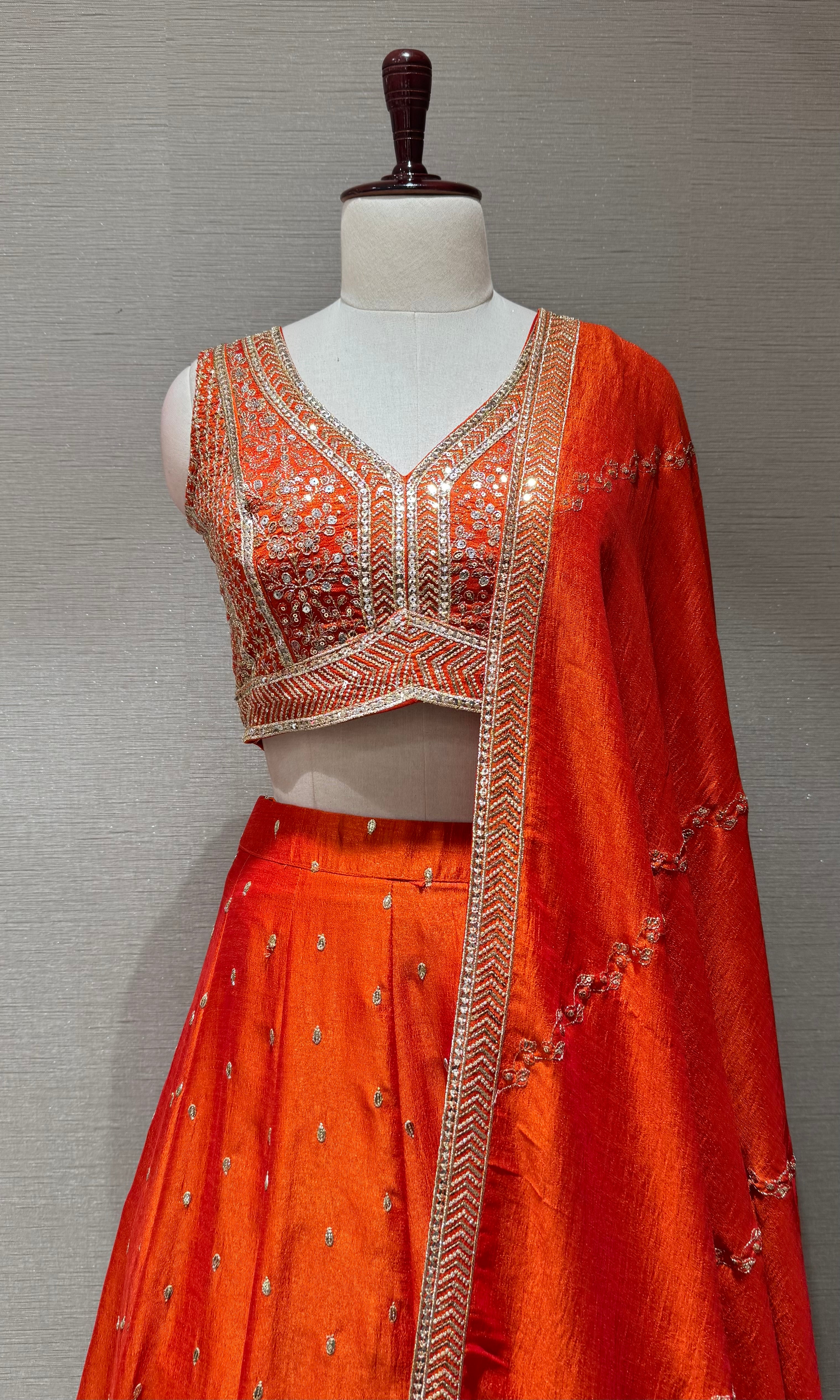 Rust Silk Lehenga set with Gold Border