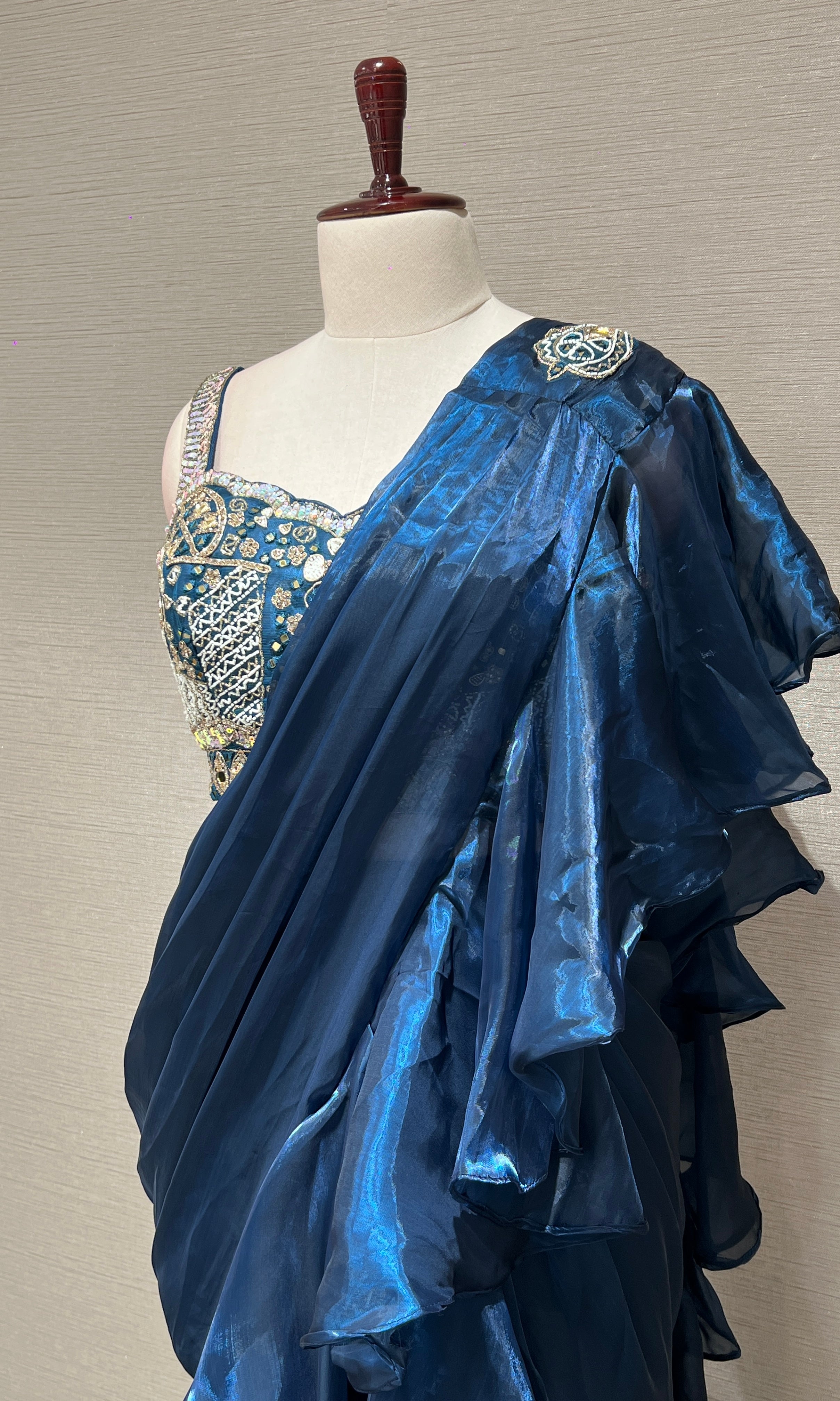 metallic blue drape saree with ruffles