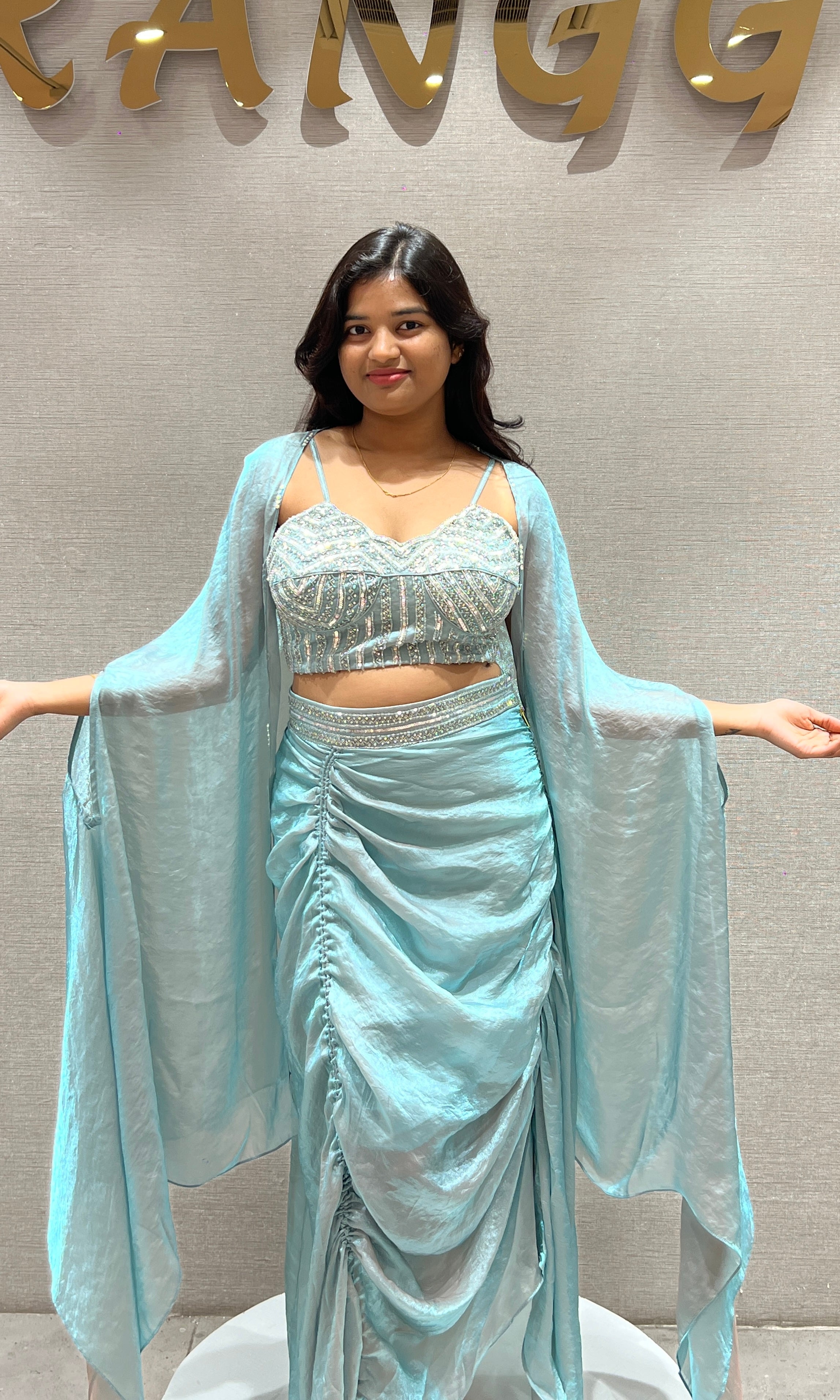 Aqua blue draped saree with Crystal Blouse