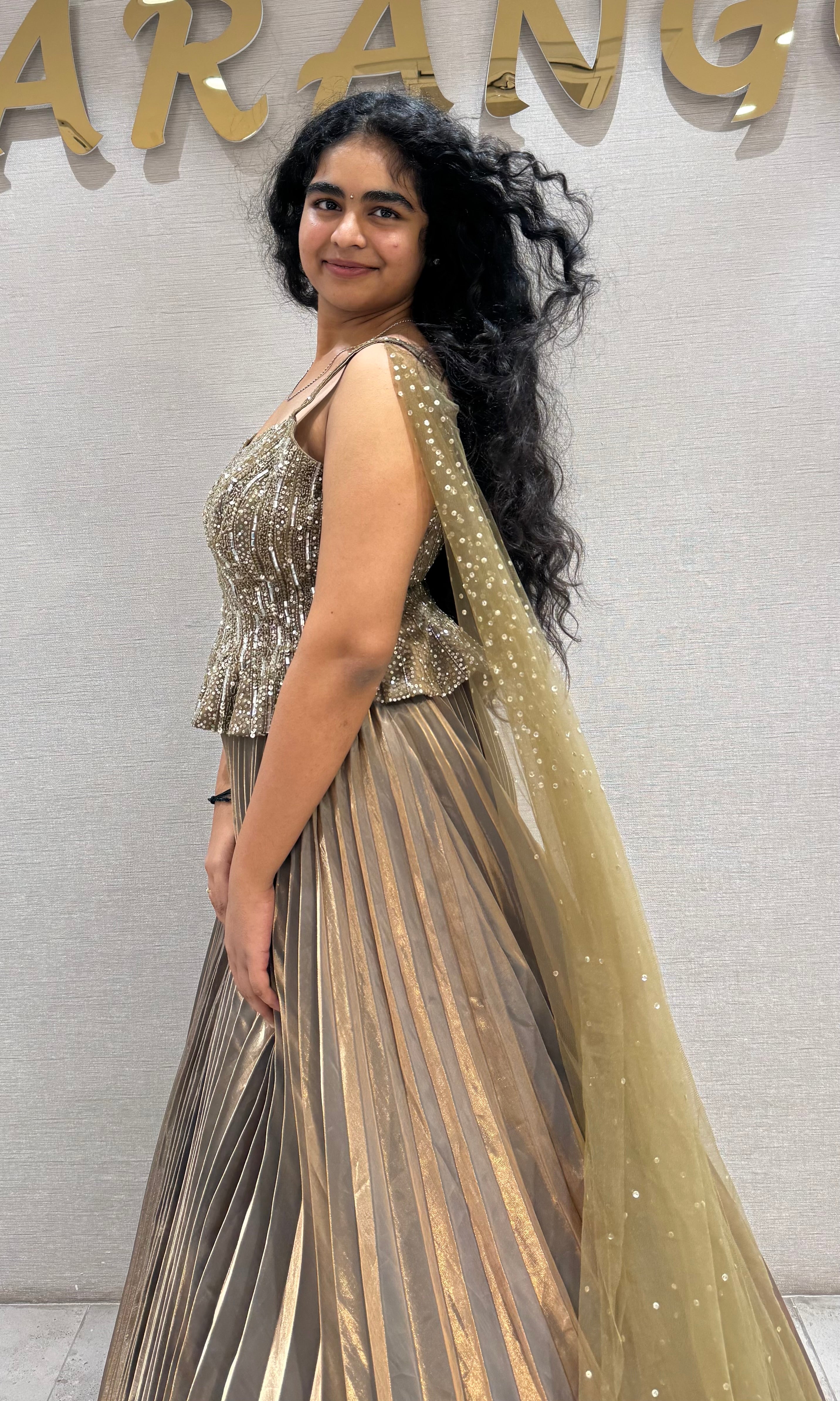 Green Golden peplum gown with cape