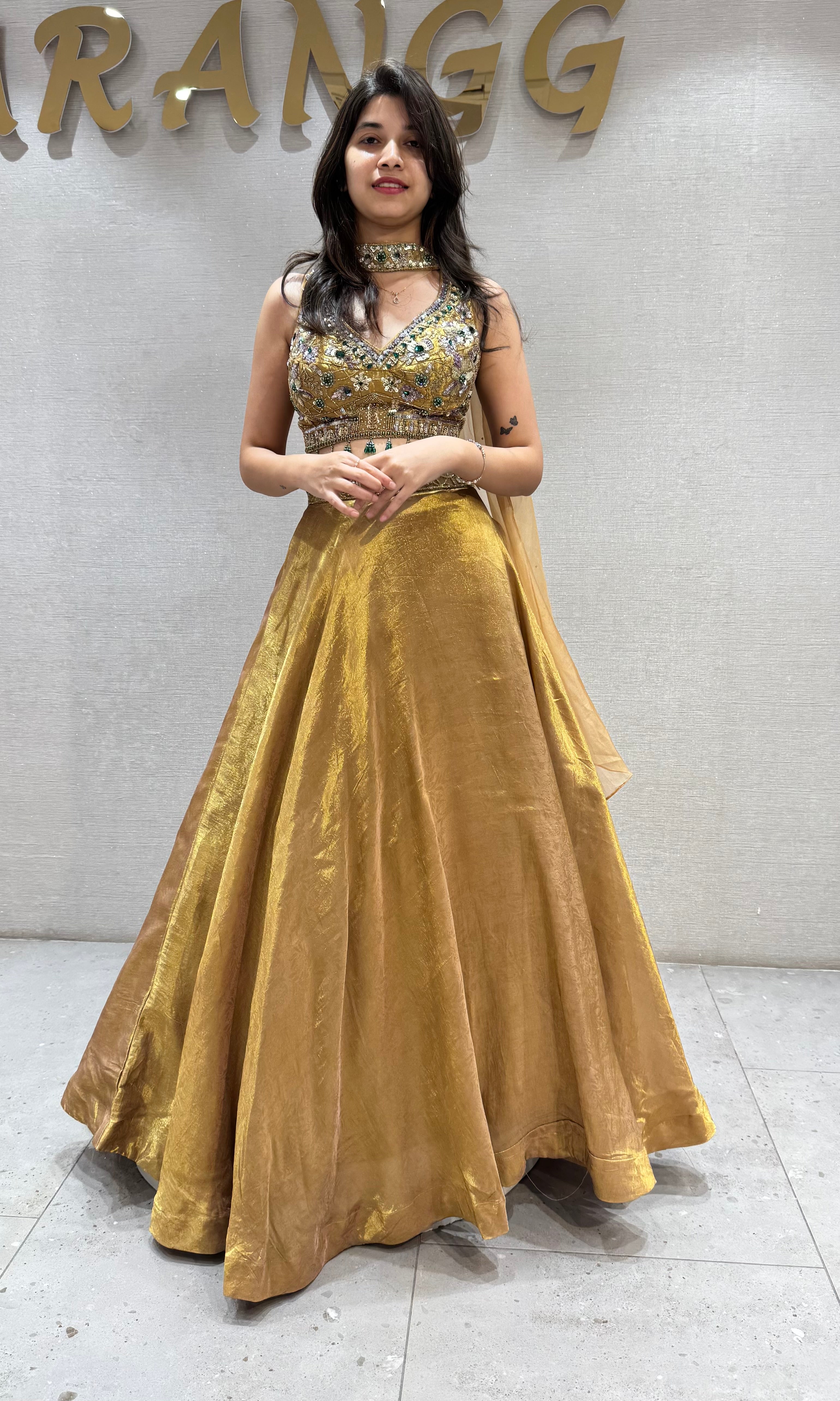 Gold tissue intricate embroidered lehenga