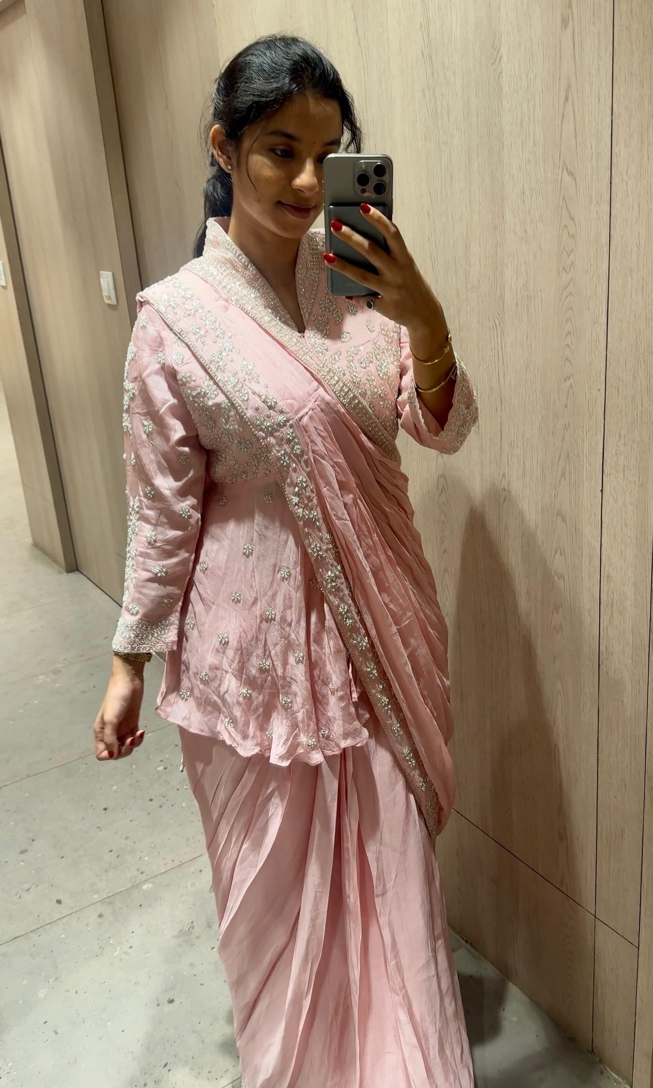 Pink pre drape saree with intricate stone work