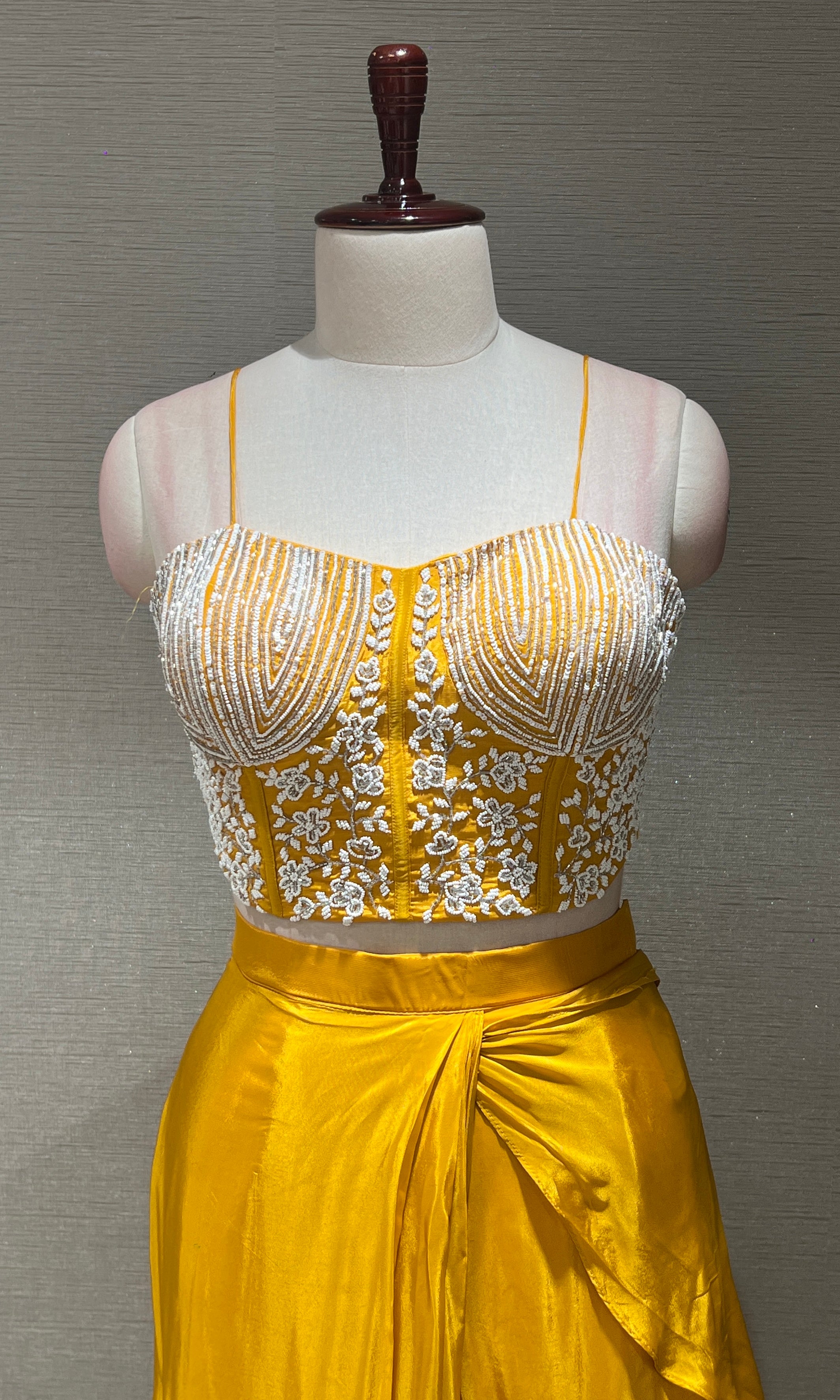 Yellow drape saree with Corset blouse