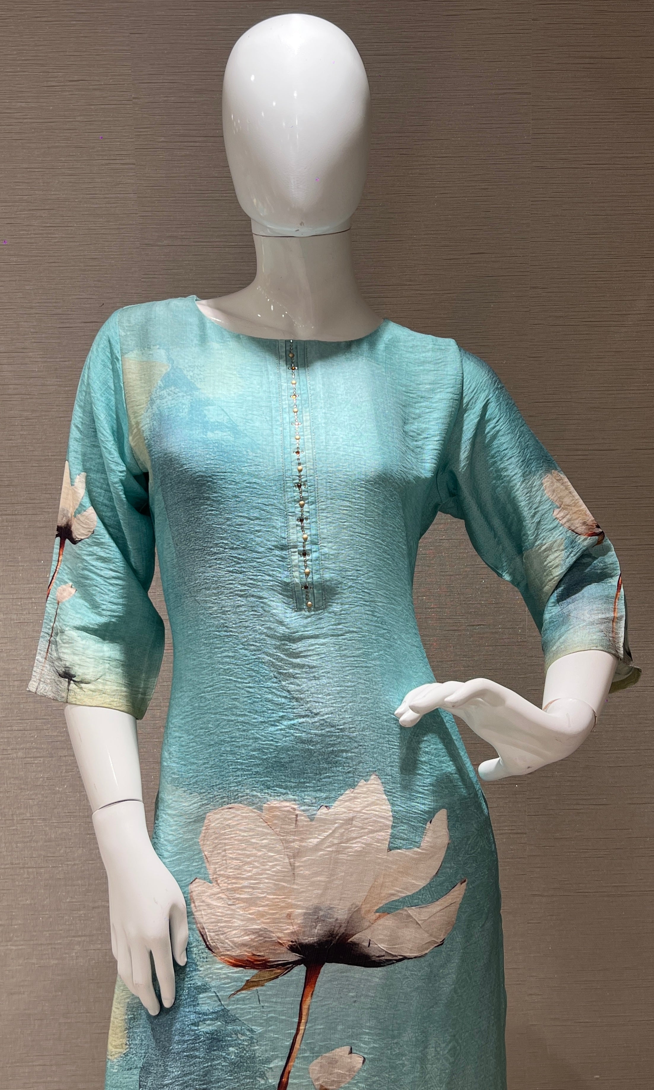 Sea blue kurti top with a floral print