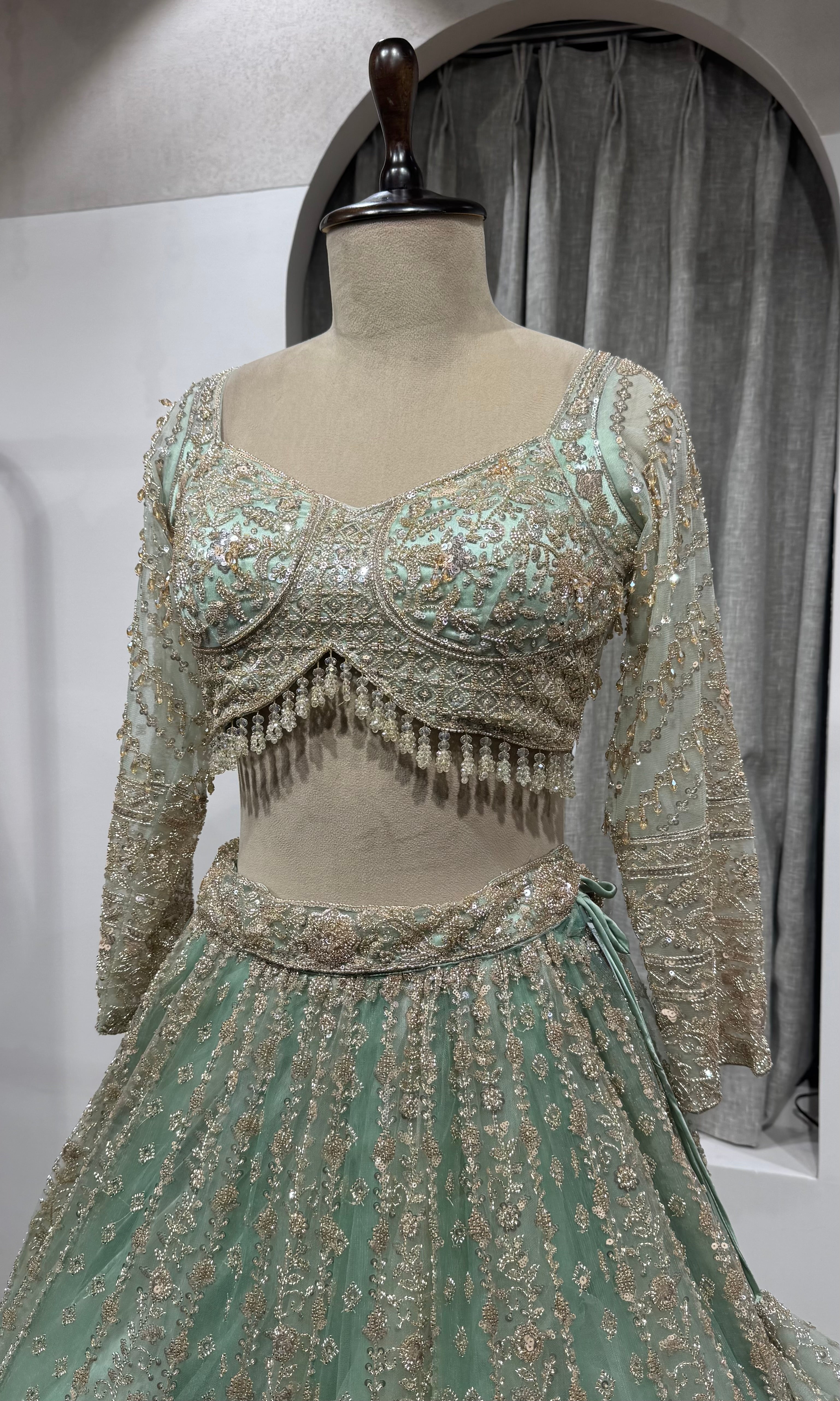 Pista Green Bridal Lehenga with Shimmering Border