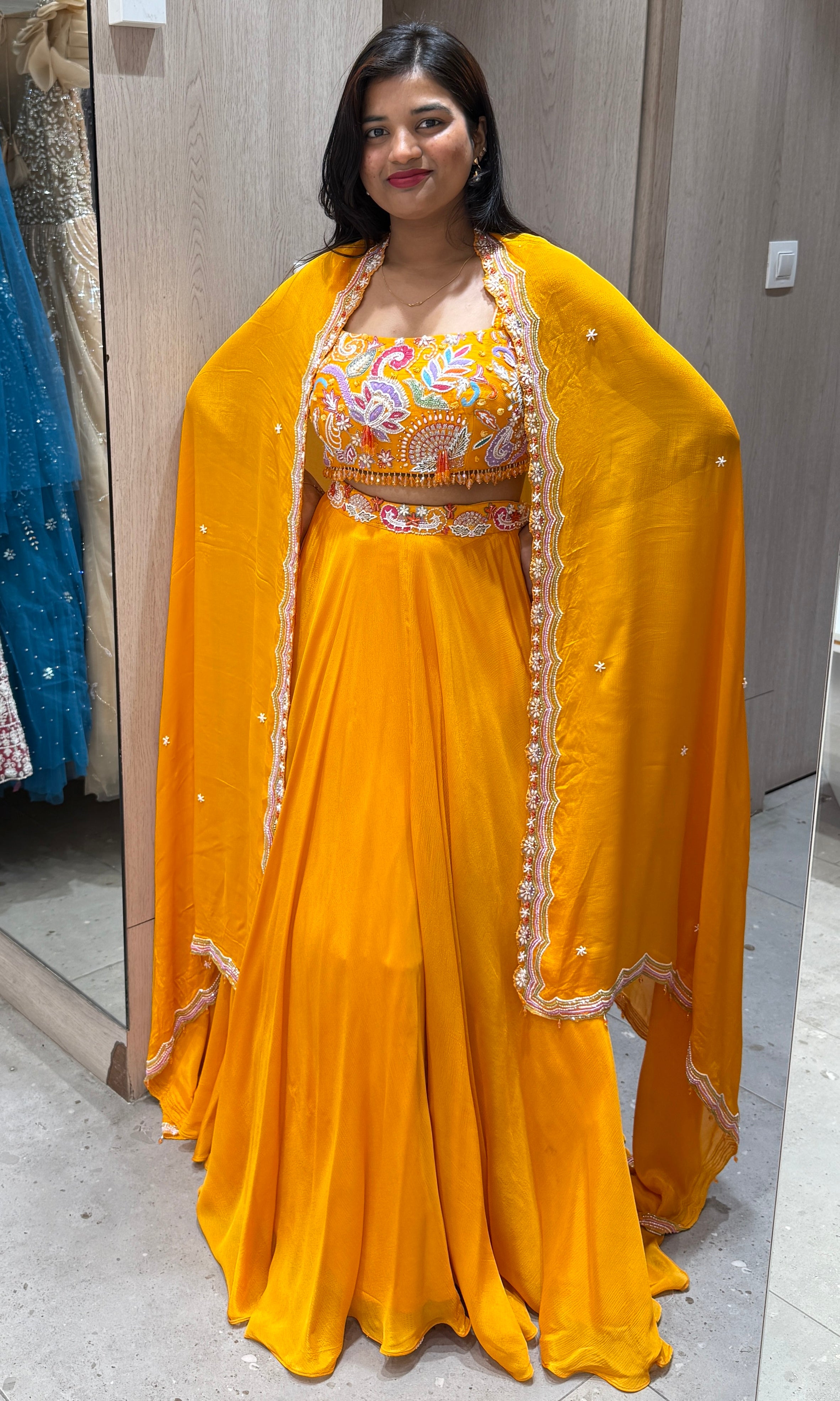 Orange lehenga with cape 1000
