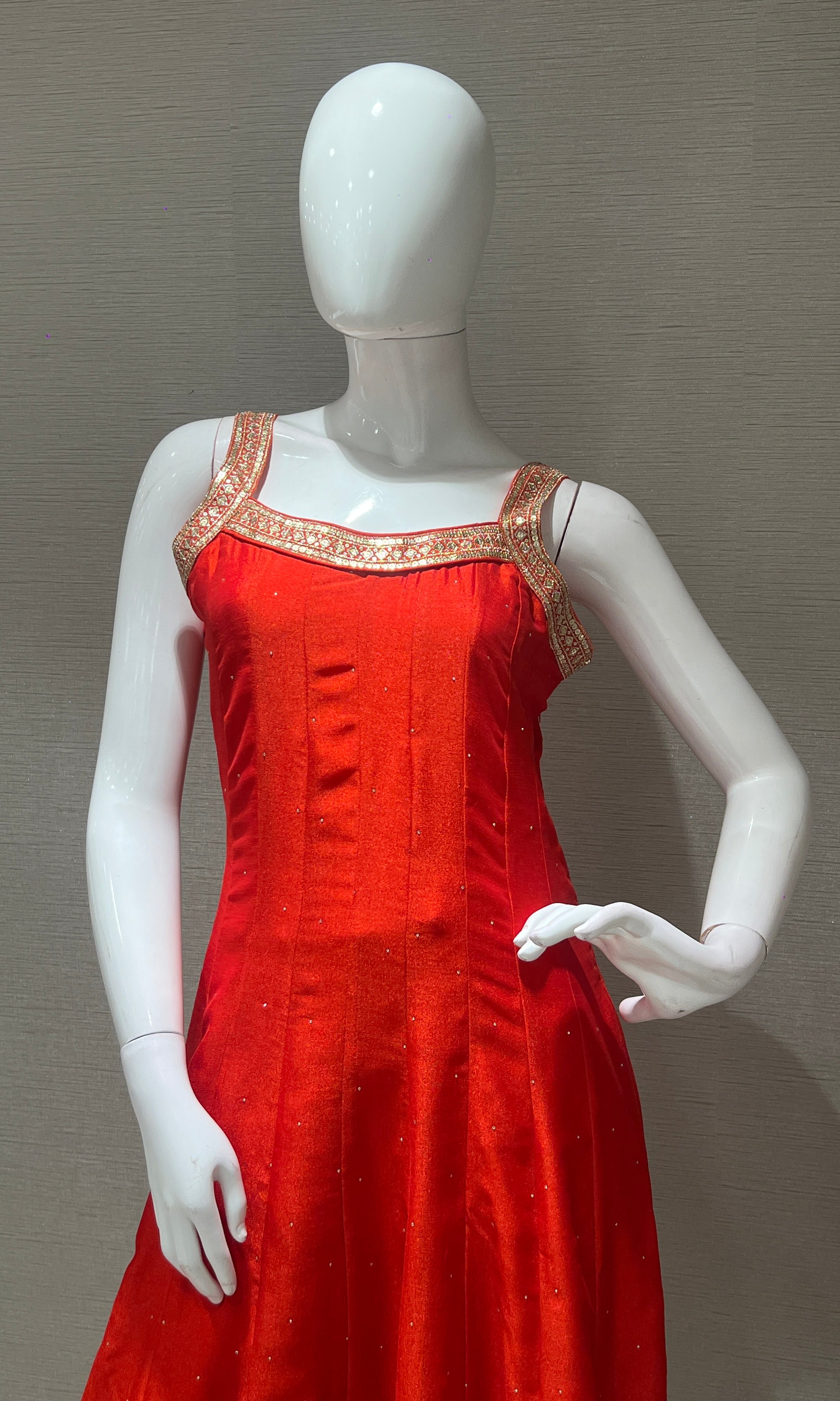 Orange anarkali set with gold embroidery