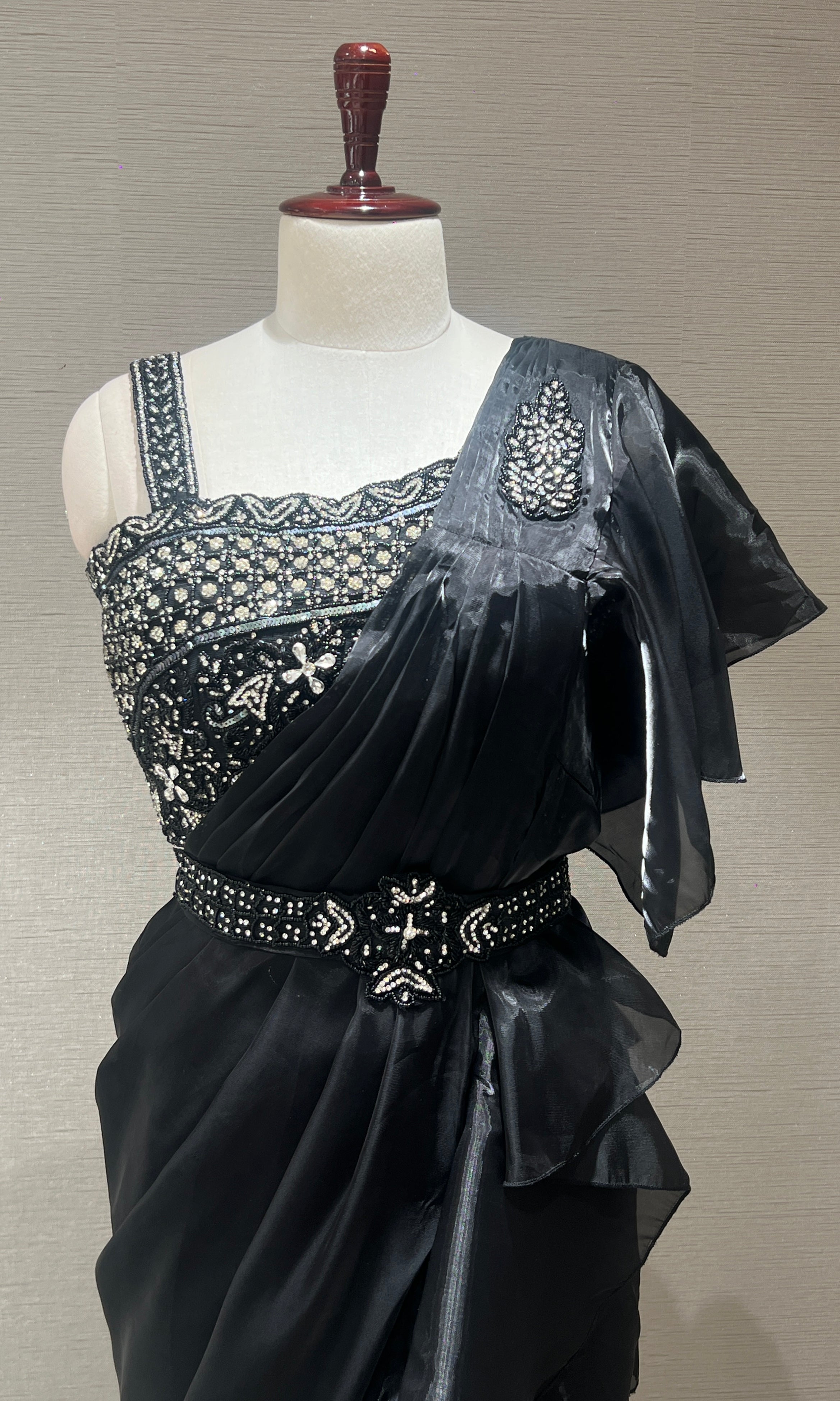 Black ruffle drape saree with embroidered blouse
