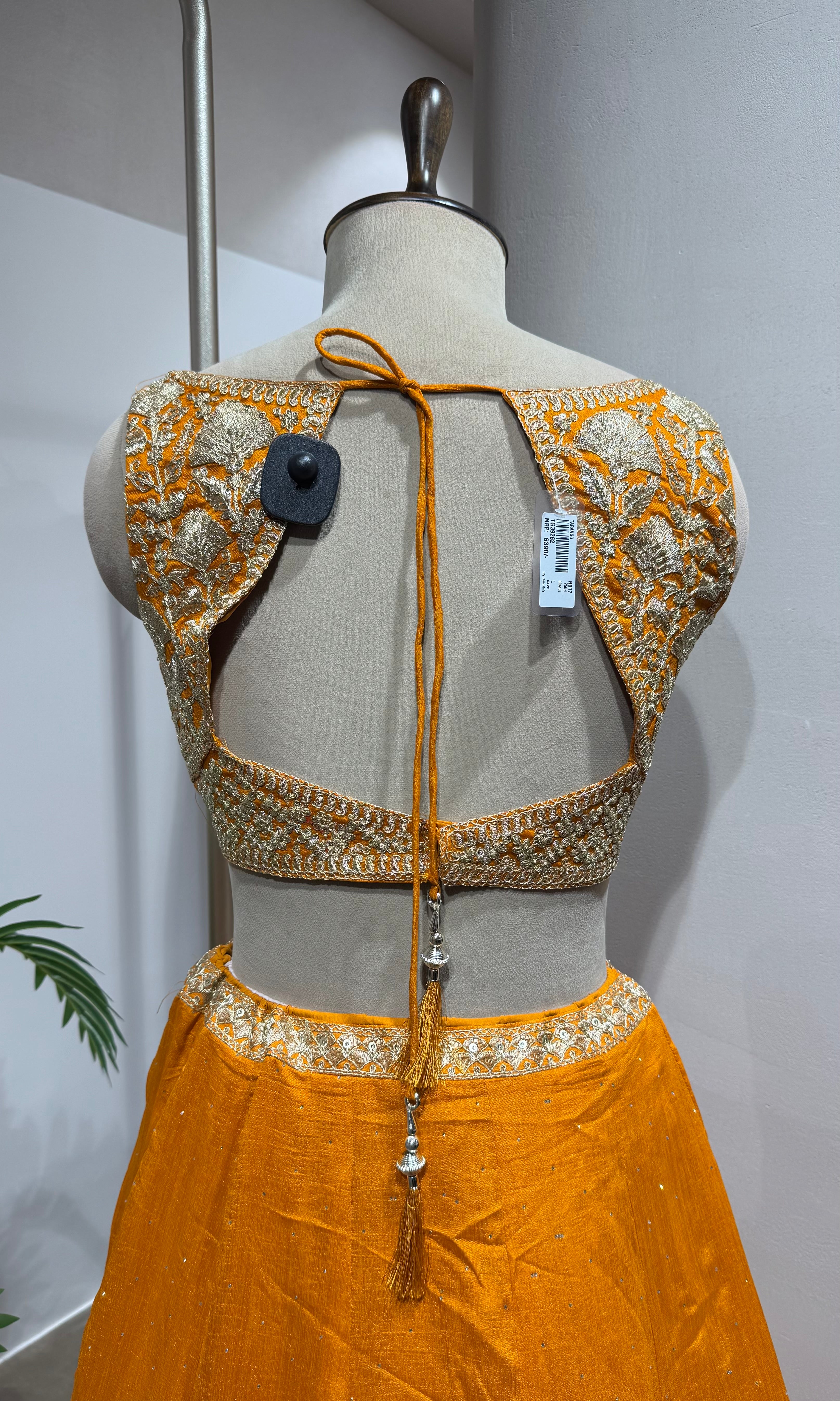 orange silk lehenga set with gold embroidery