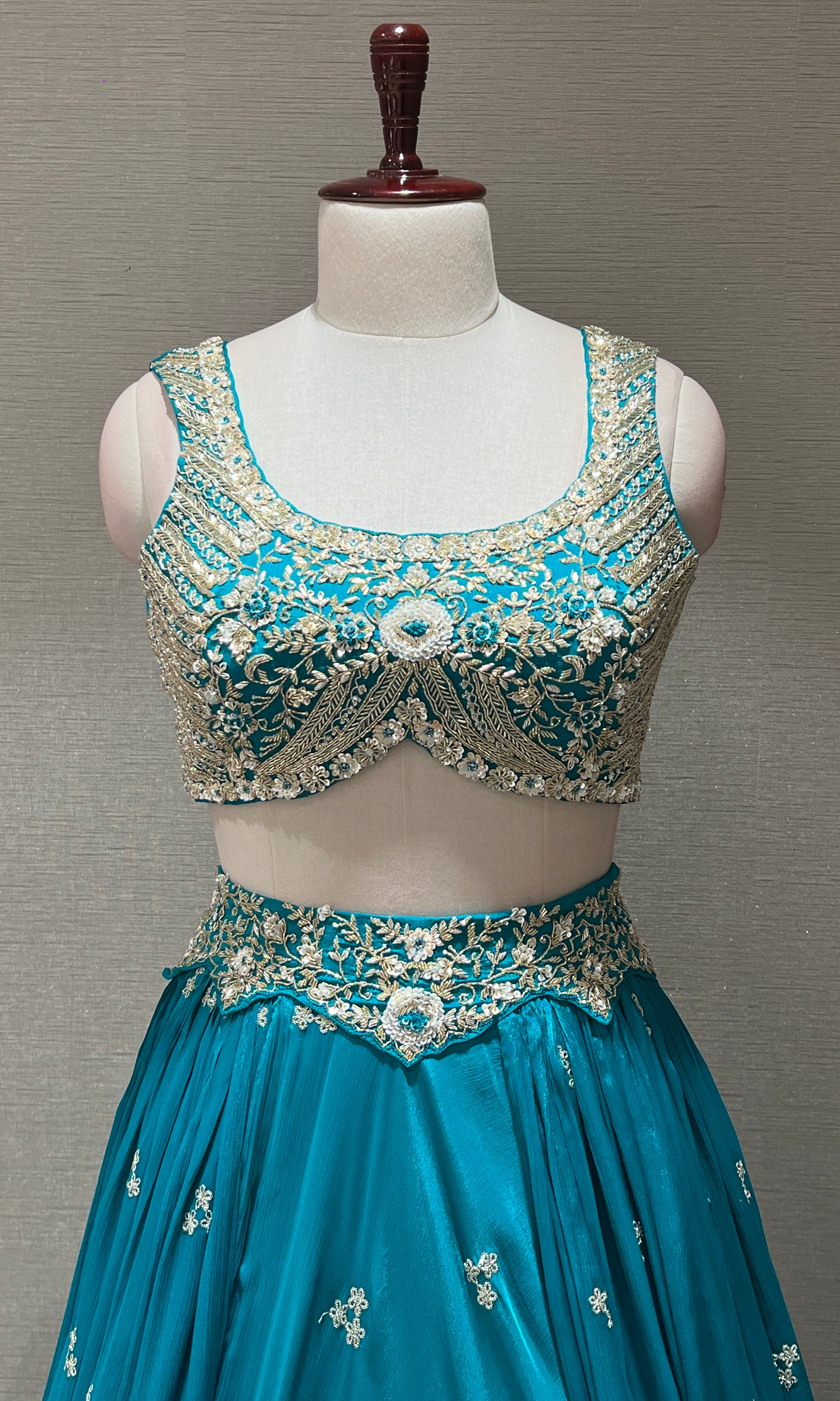 Teal blue gold zari embroidered lehenga