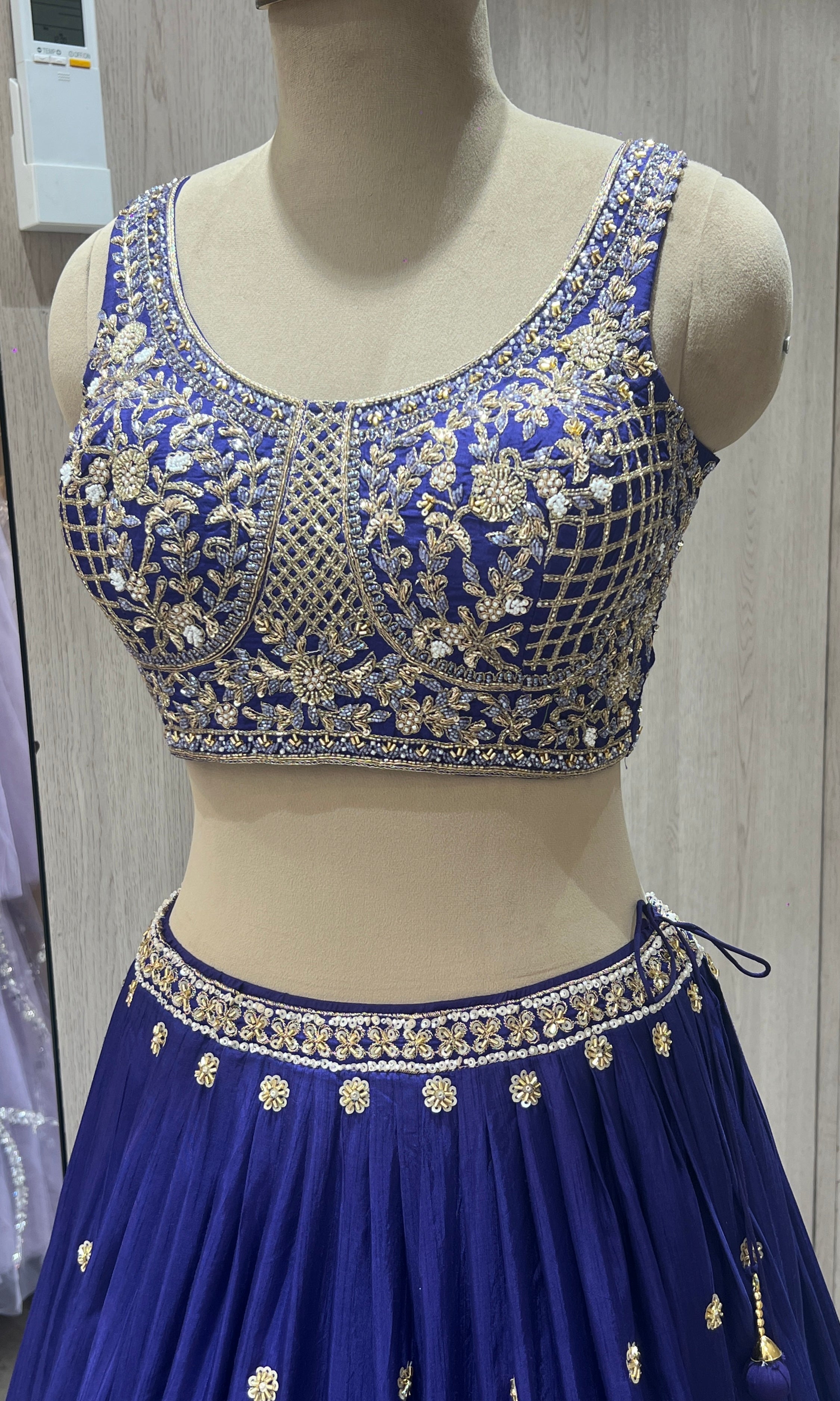 Purple lehenga with gold embroidered work