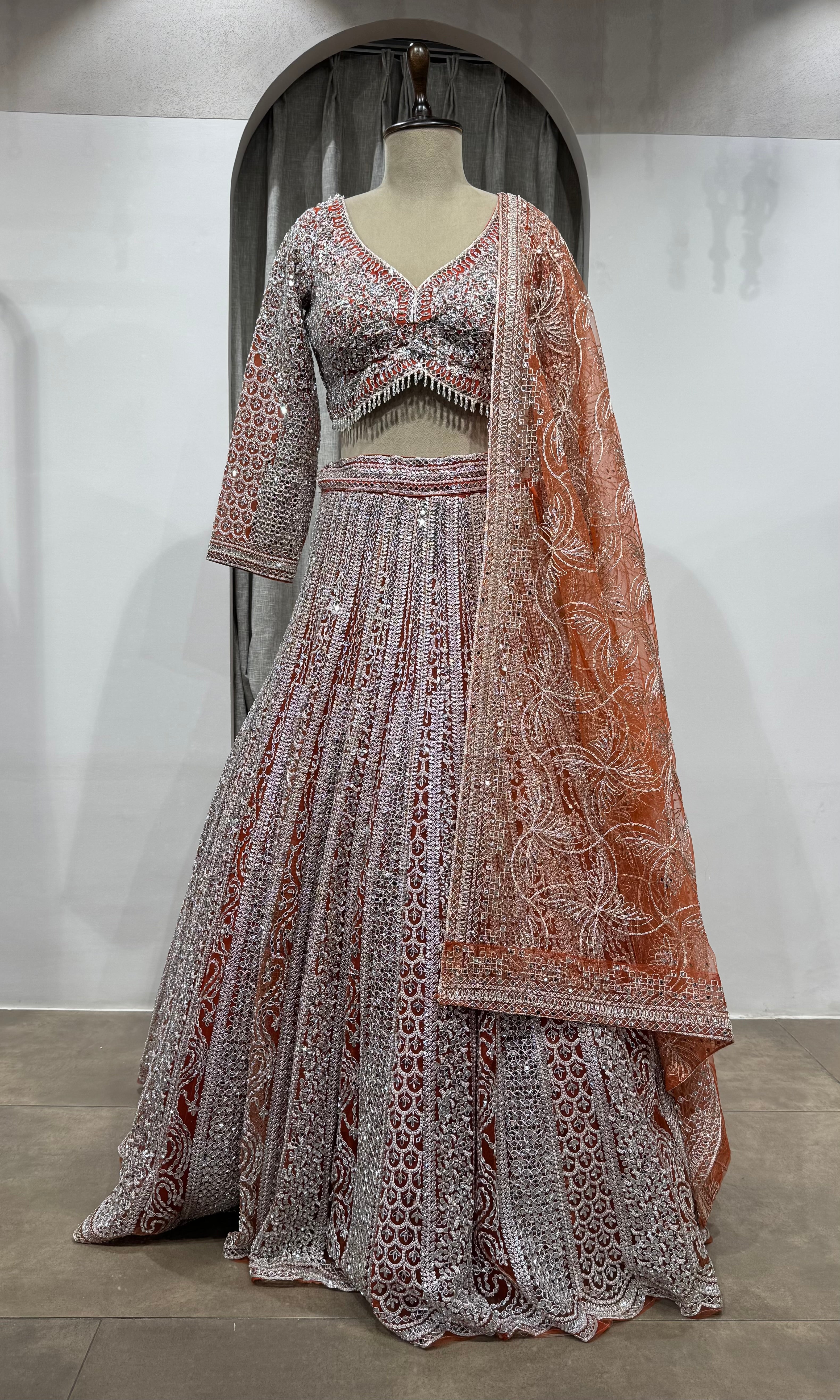 Rust and grey heavy bridal lehenga