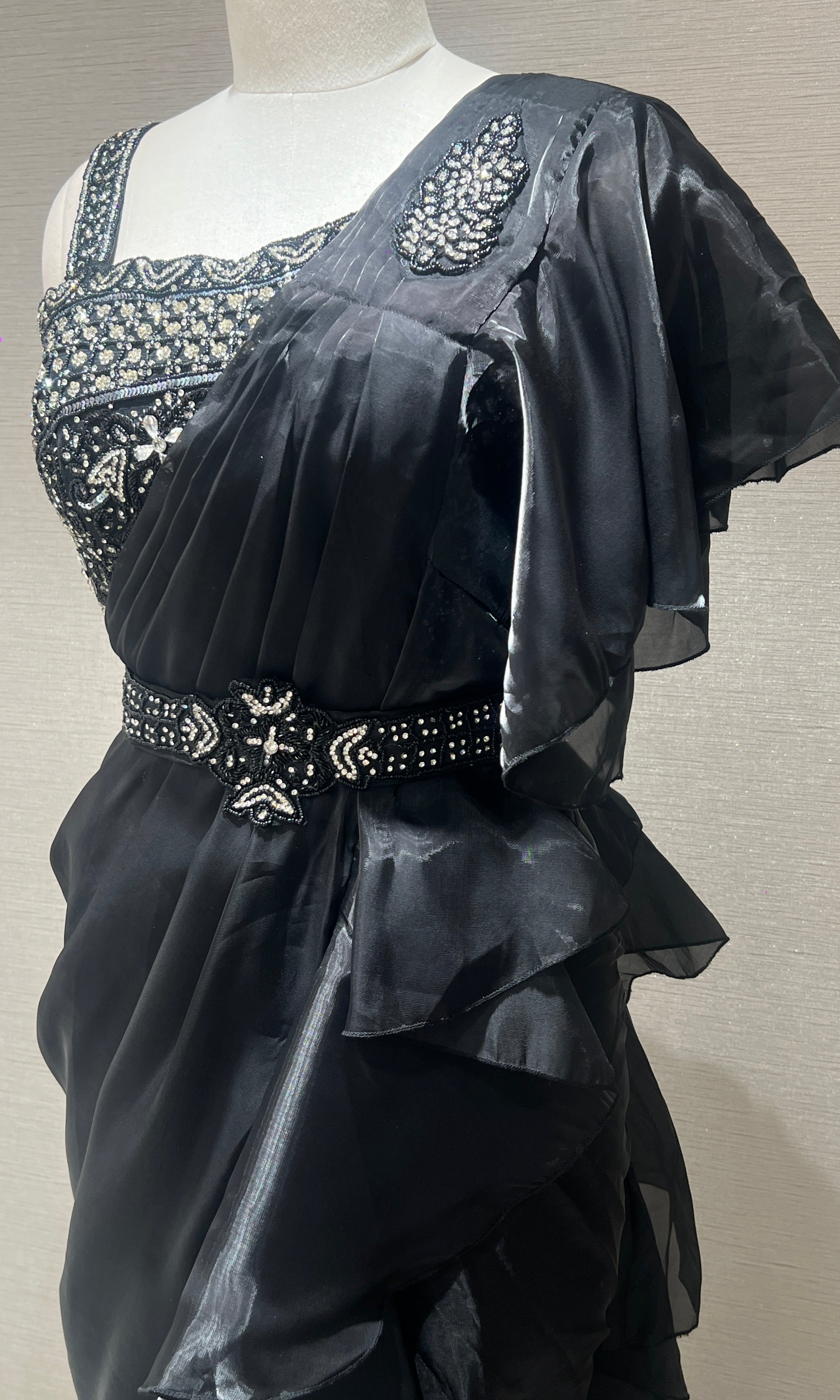 Black ruffle drape saree with embroidered blouse