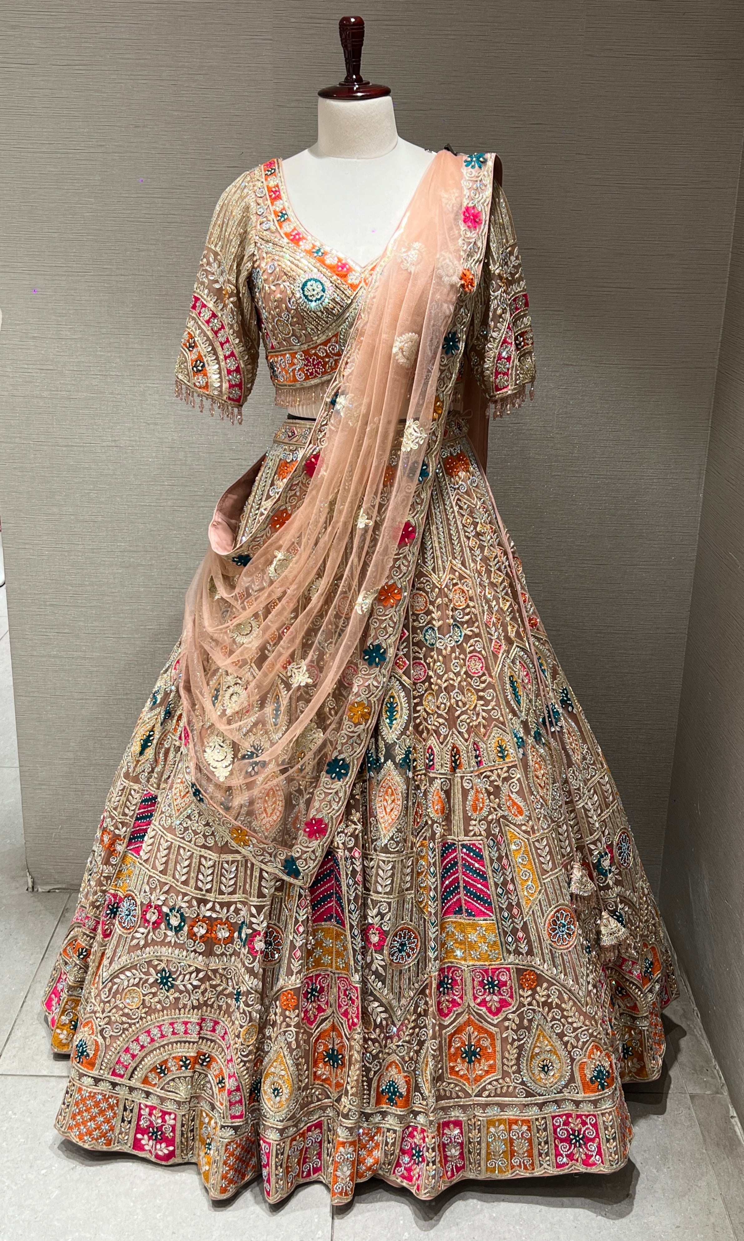 Peach Lehenga with Sequin and stone embellishments