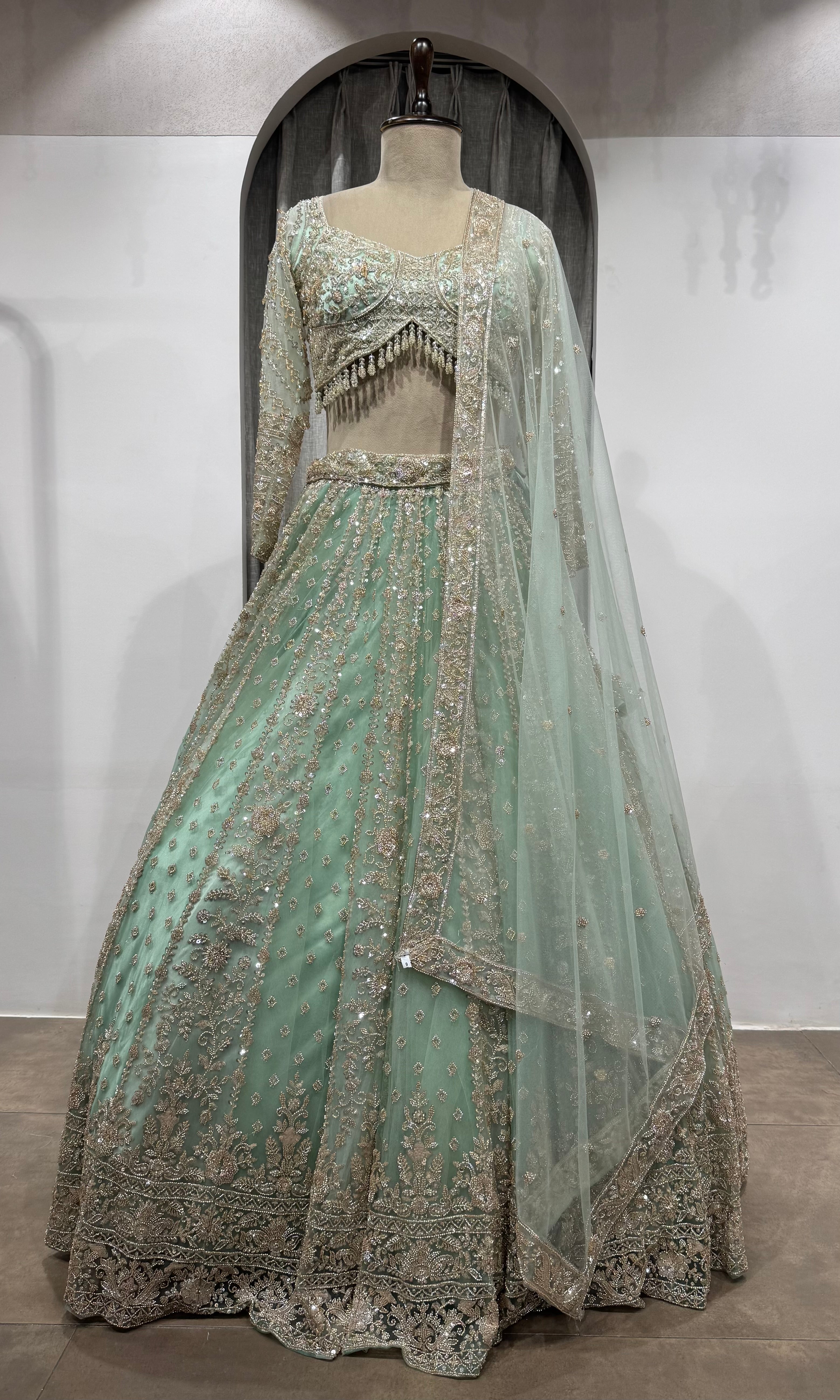 Pista Green Bridal Lehenga with Shimmering Border