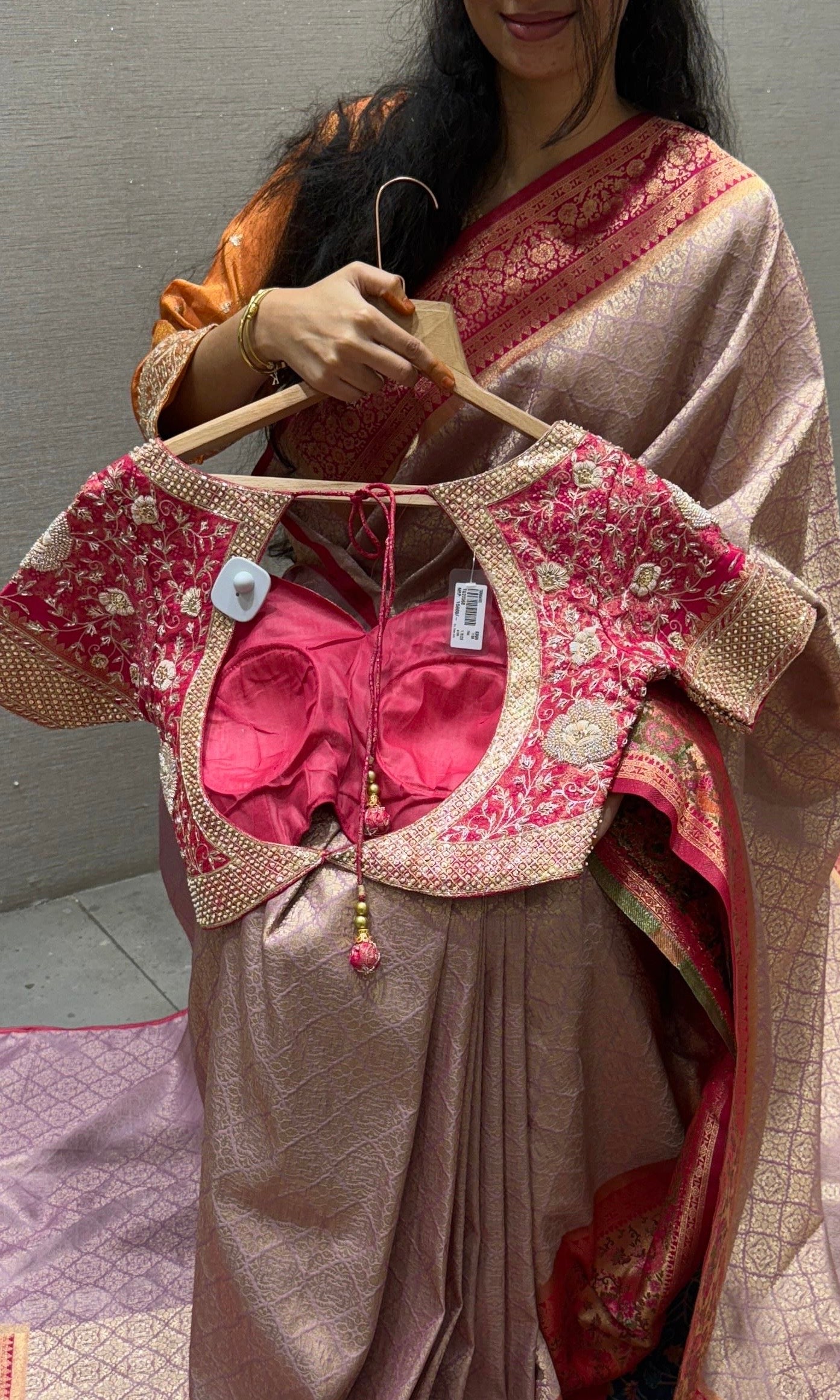 Pink saree with embroidered ready blouse