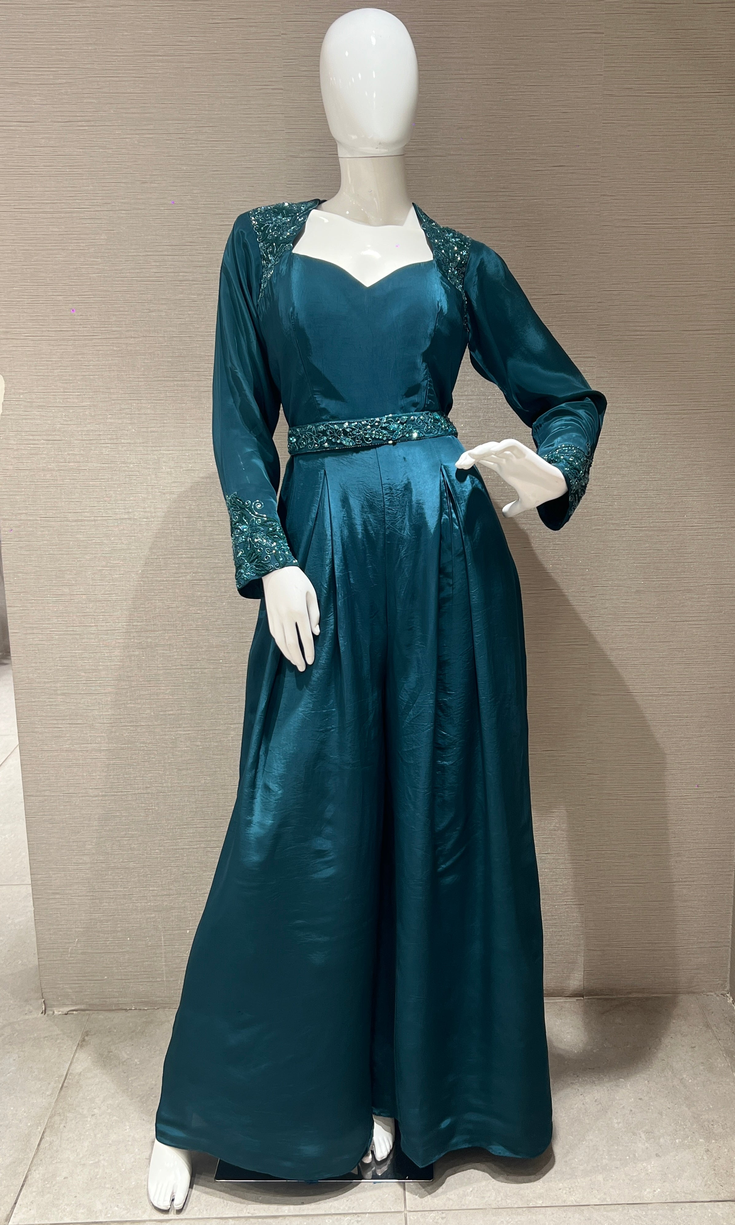 Green jumpsuit with belt