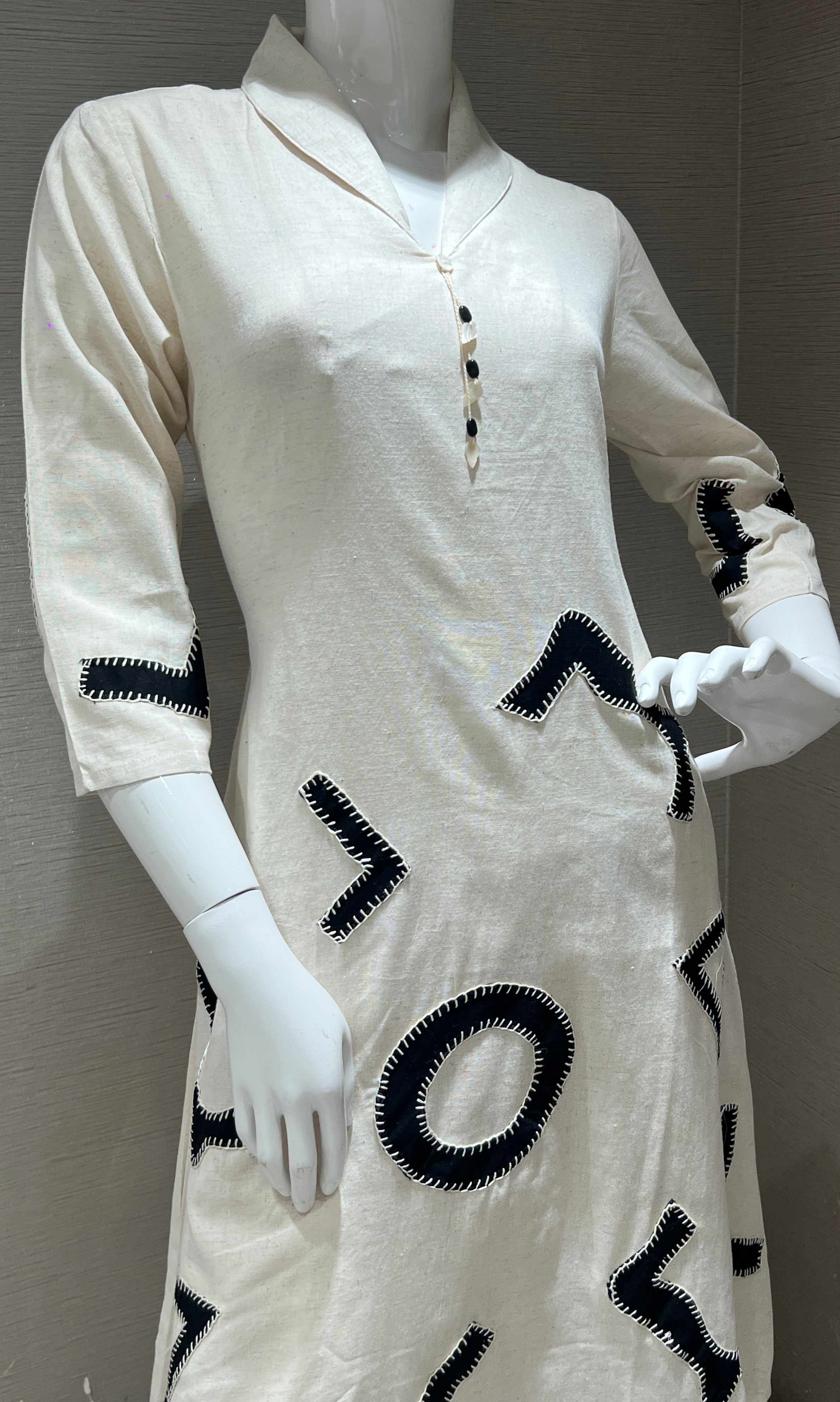 Cream kurta set with a black abstract print