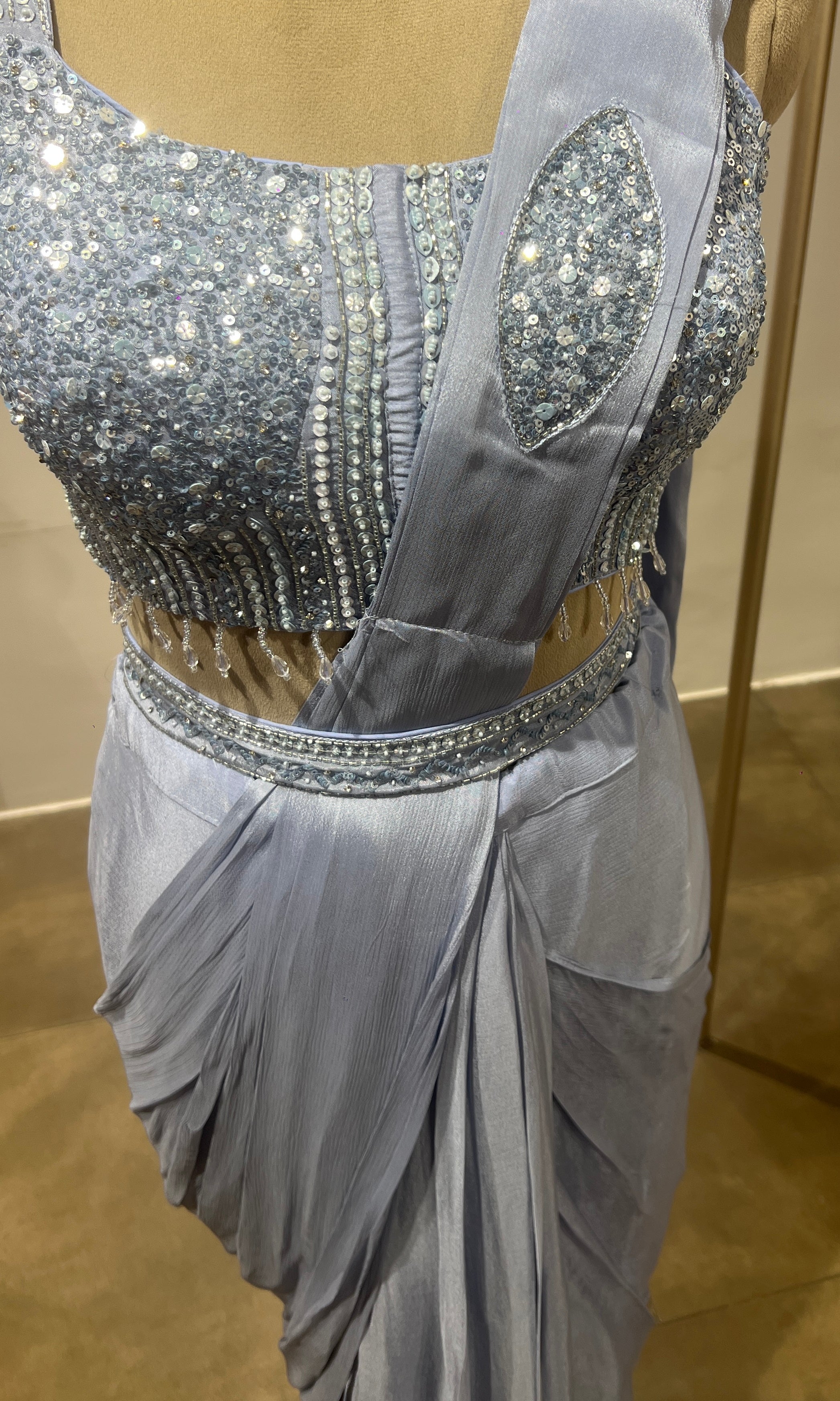 Blue satin drape saree with embellished blouse