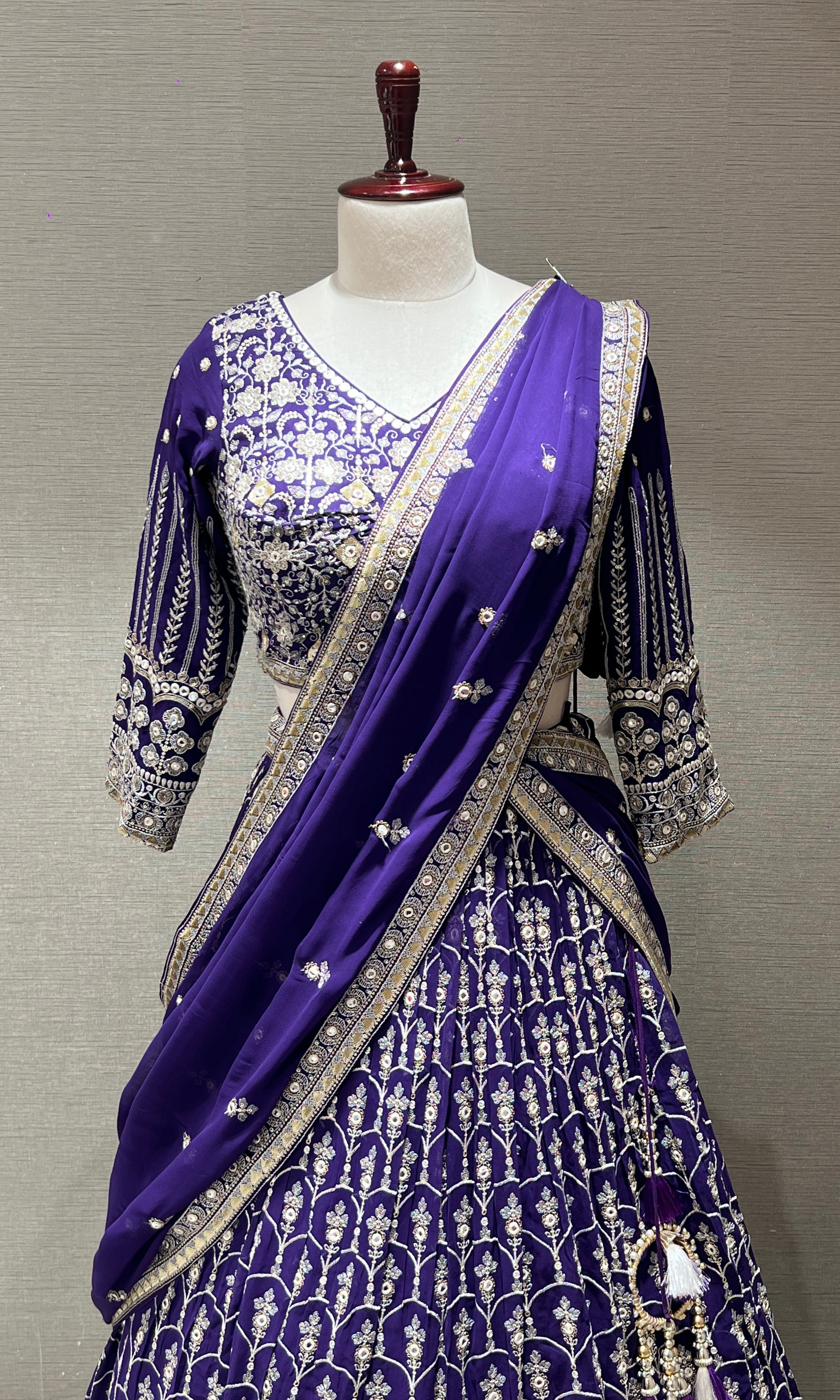 Purple Lehenga with intricate embroidery
