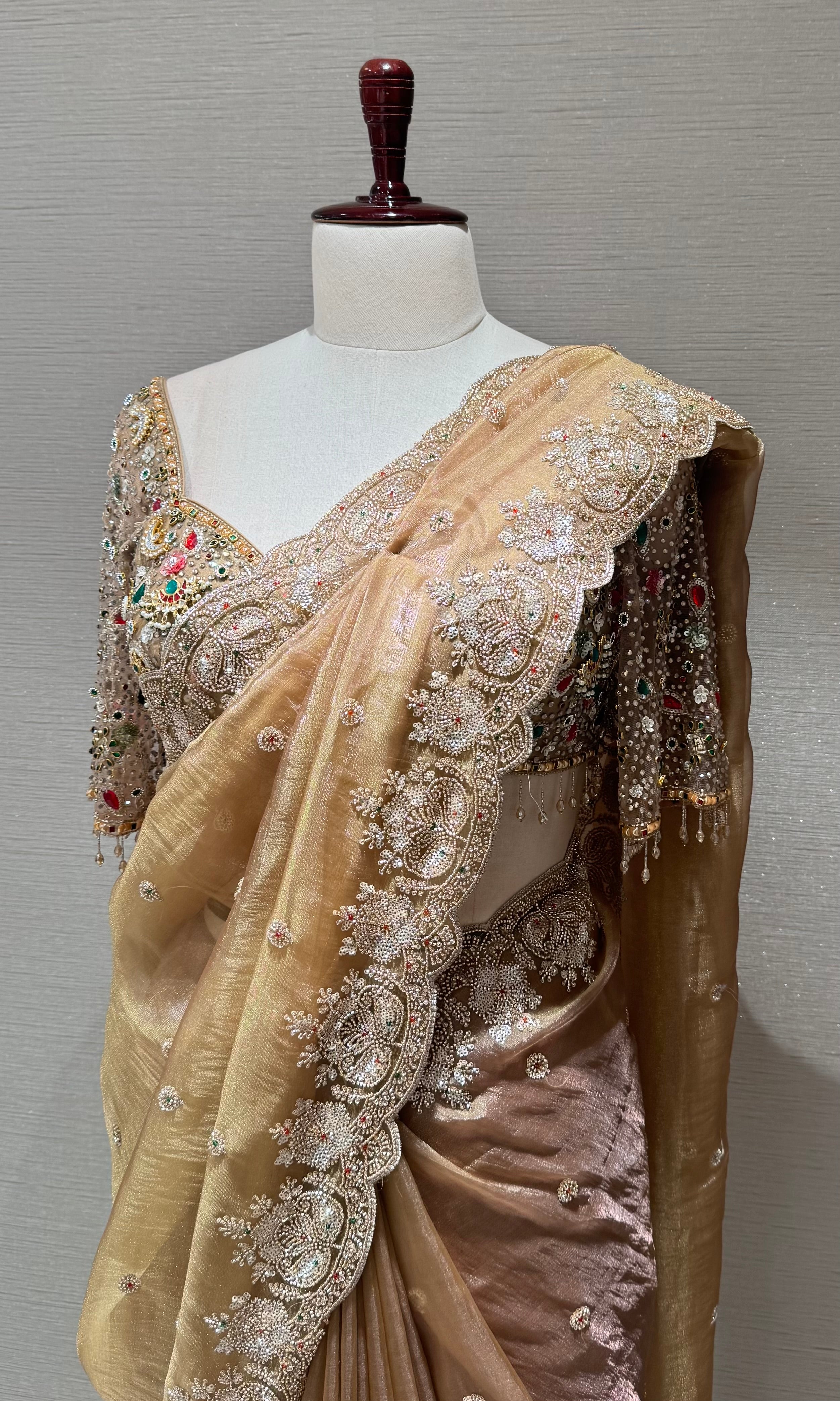 beige net designer saree with embroidered blouse