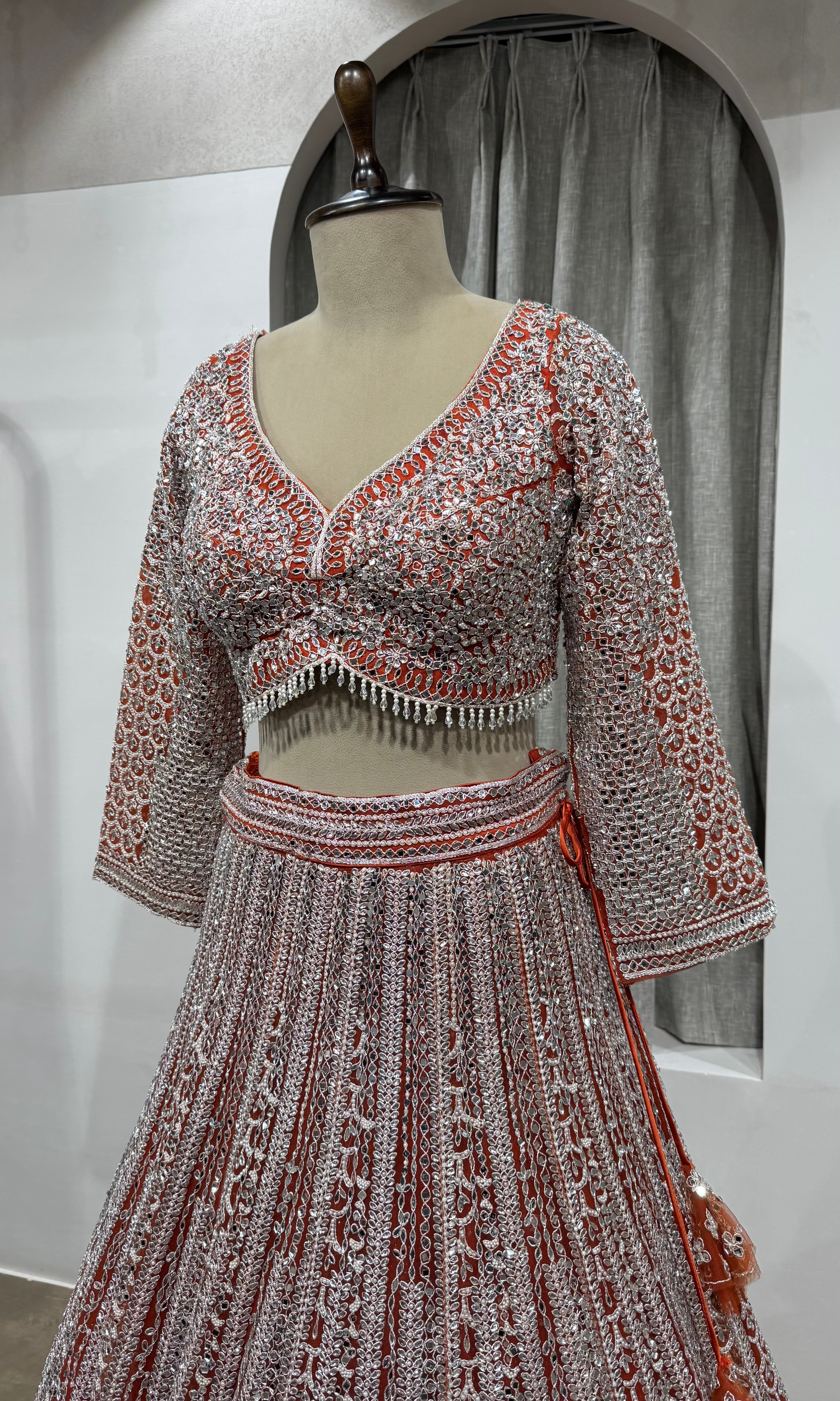 Rust and grey heavy bridal lehenga