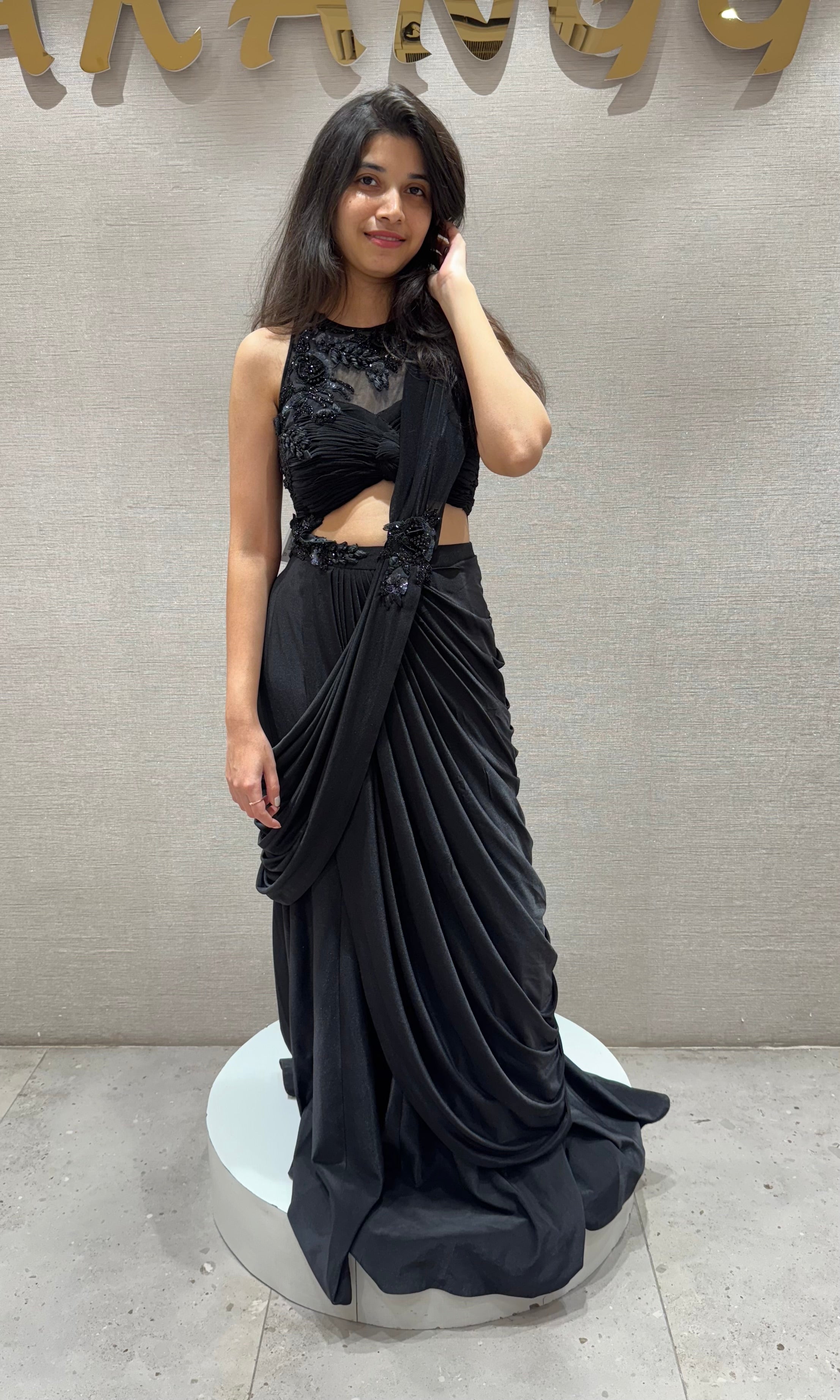 Black drape saree with halter neck blouse