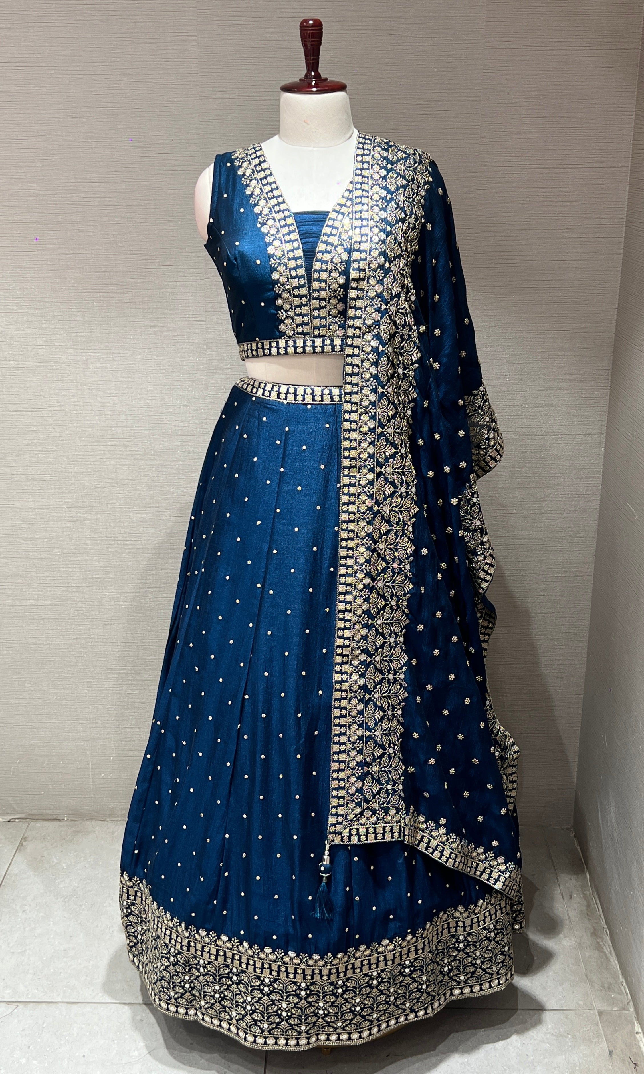 Elegant Blue Lehenga with embroidered gold