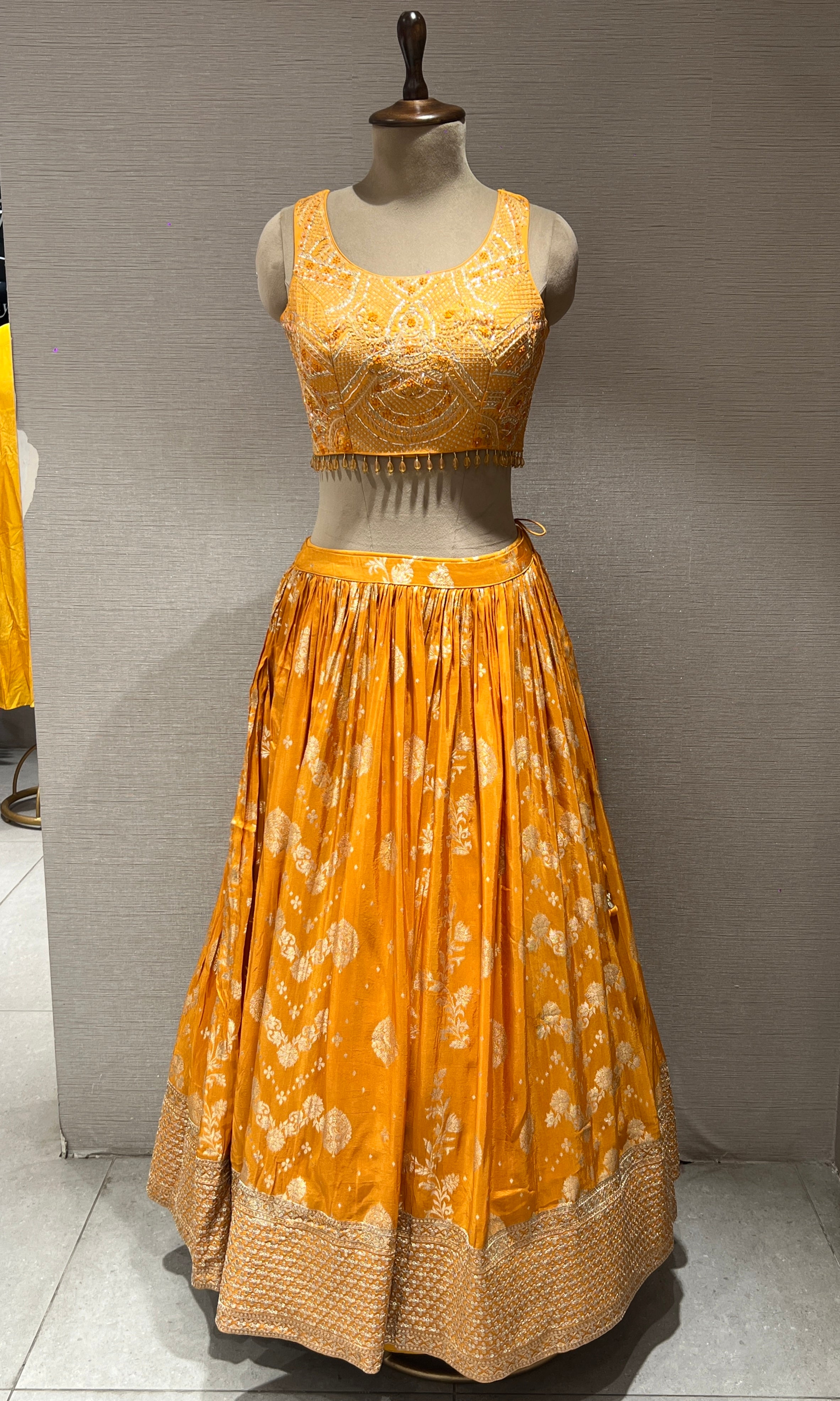 Elegant Yellow Lehenga with sheer dupatta