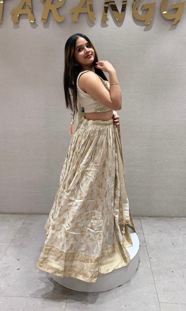 Pearl white lehenga with gold embroidered