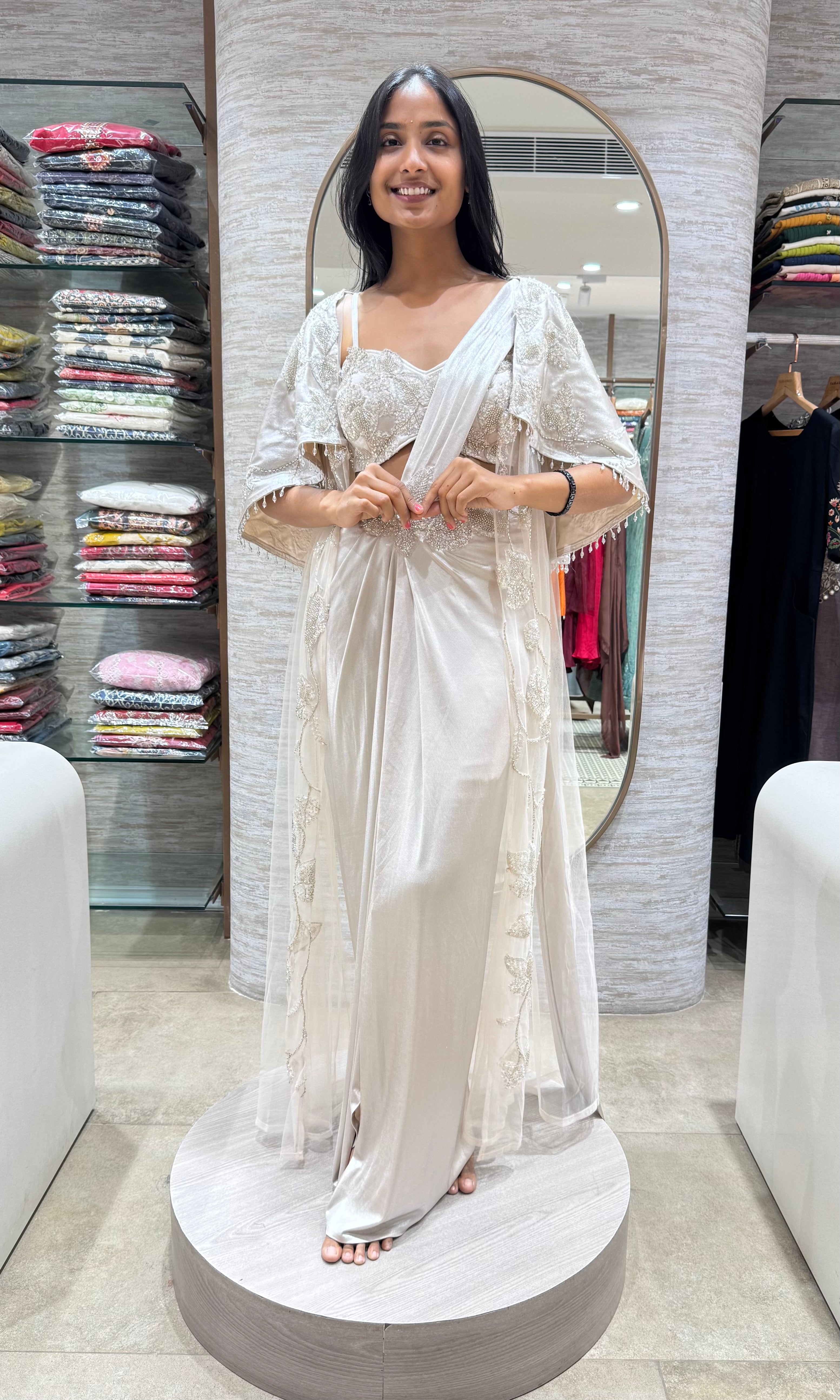 SILVER DRAPE SAREE WITH CORSET BLOUSE & CAPE
