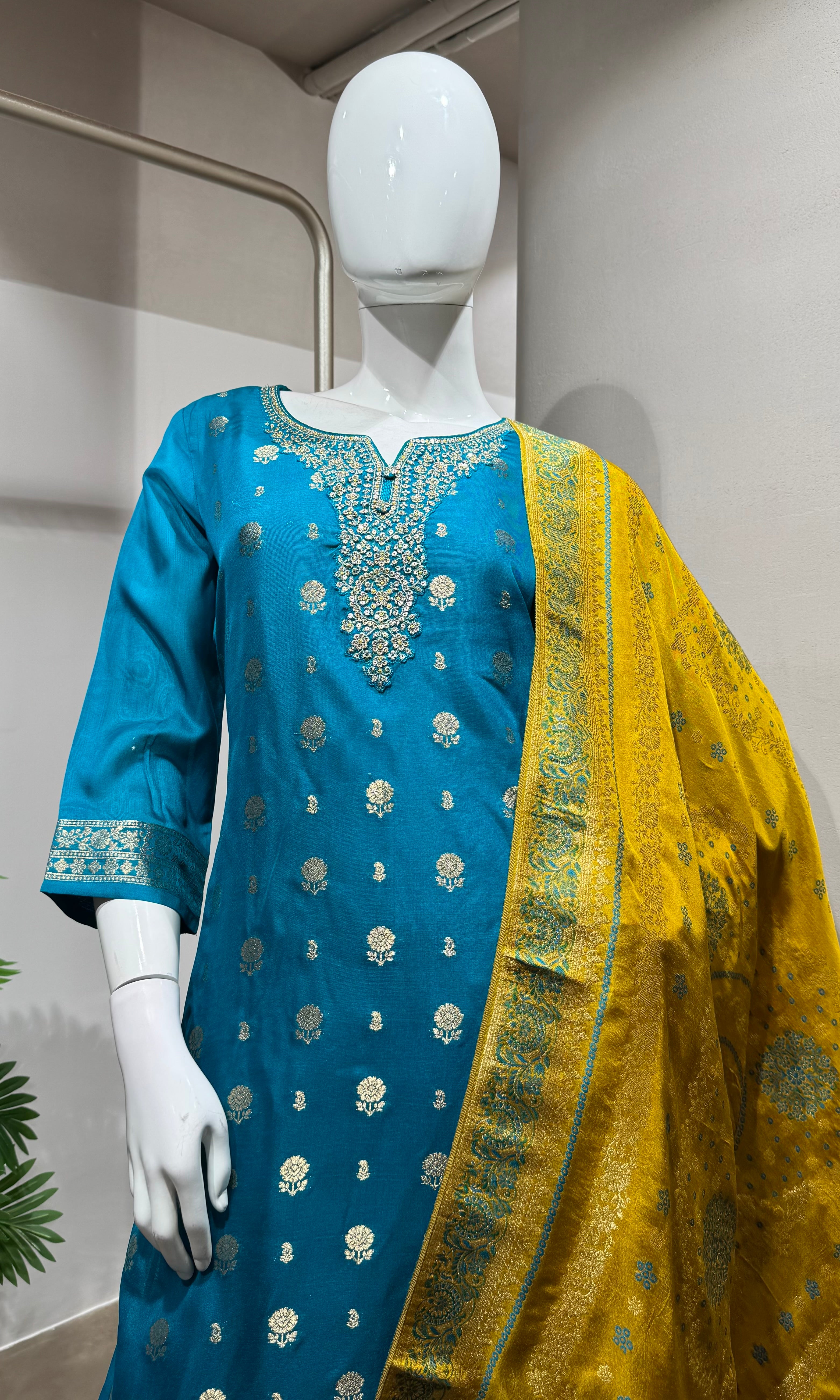 Rama blue silk kurta set with yellow dupatta