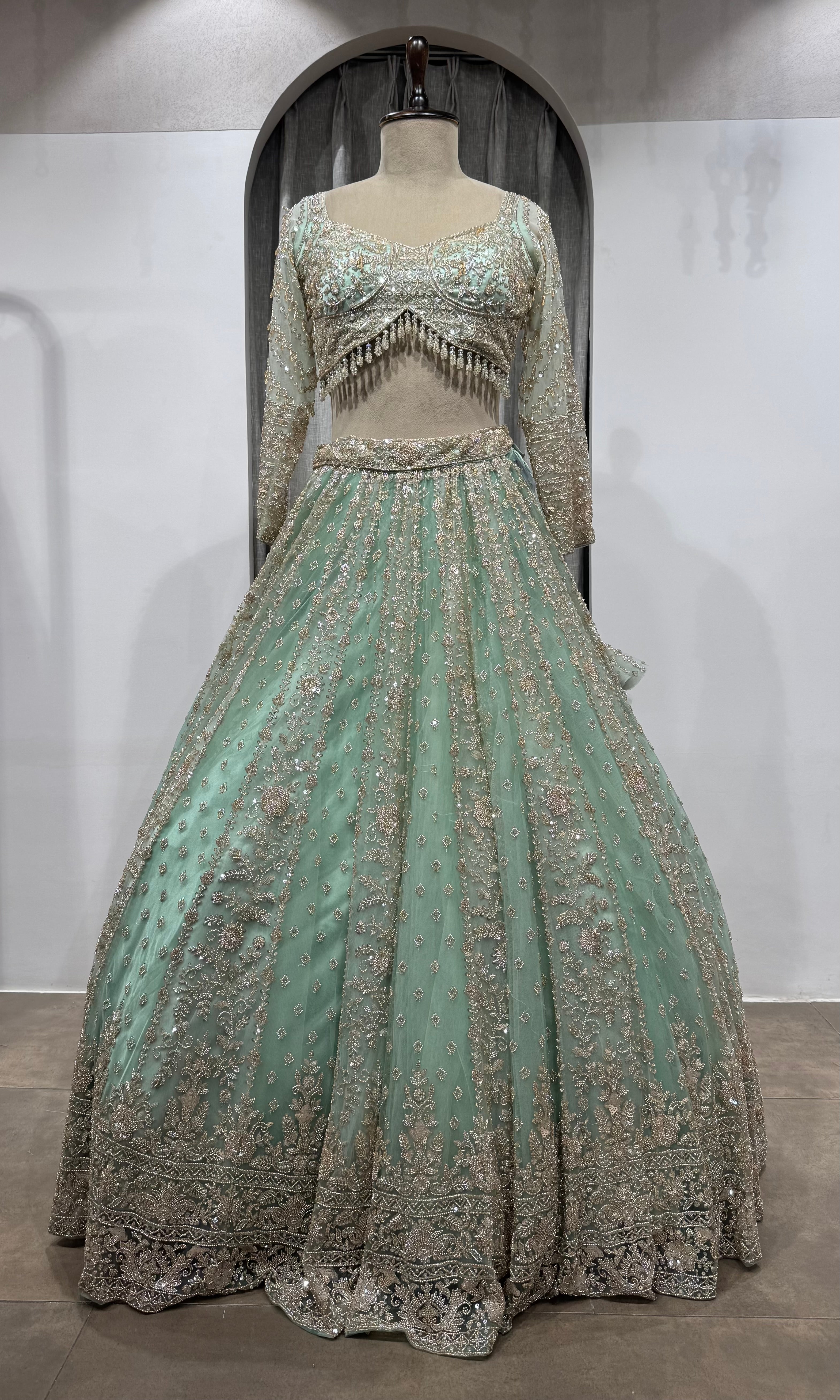 Pista Green Bridal Lehenga with Shimmering Border