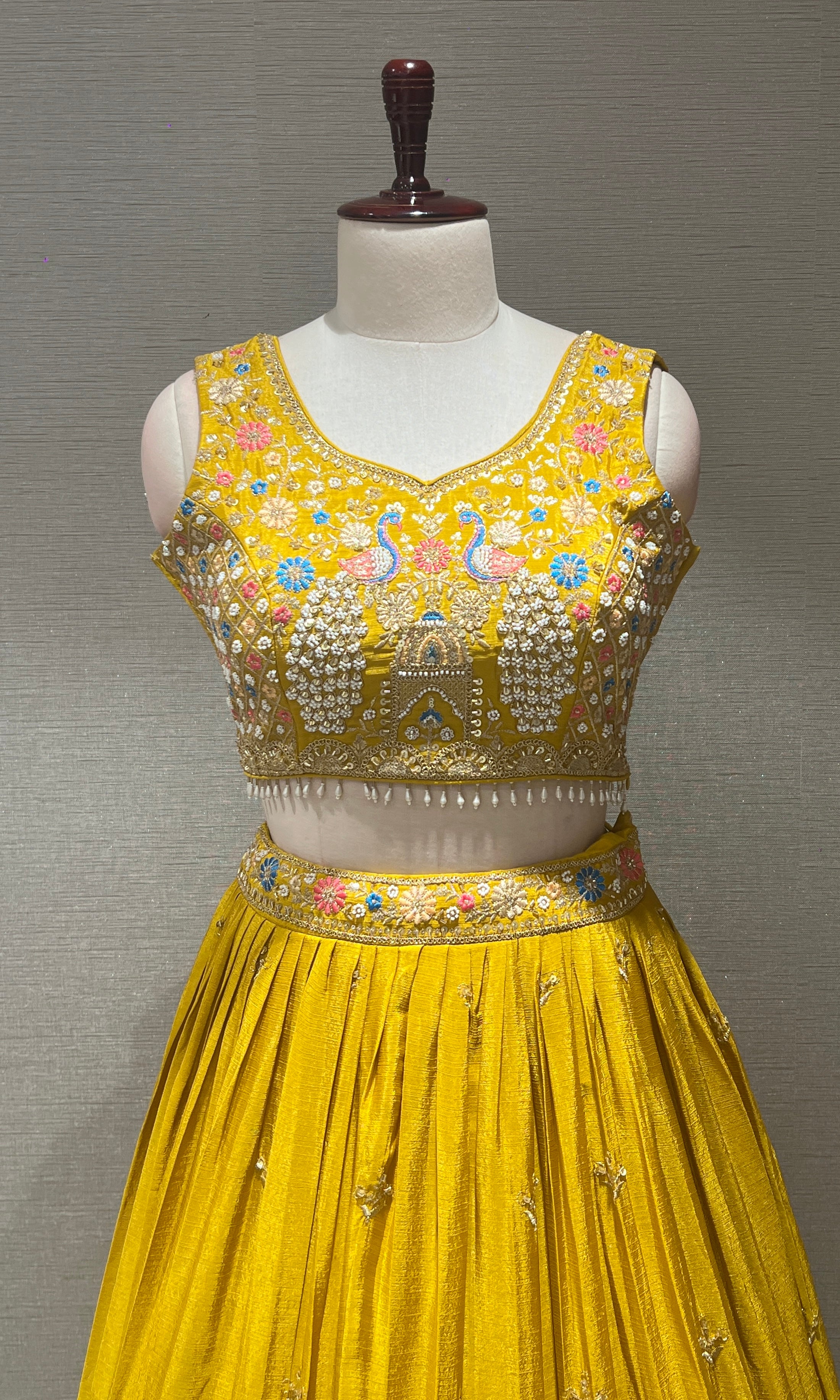 Yellow peacock embroidered Lehenga