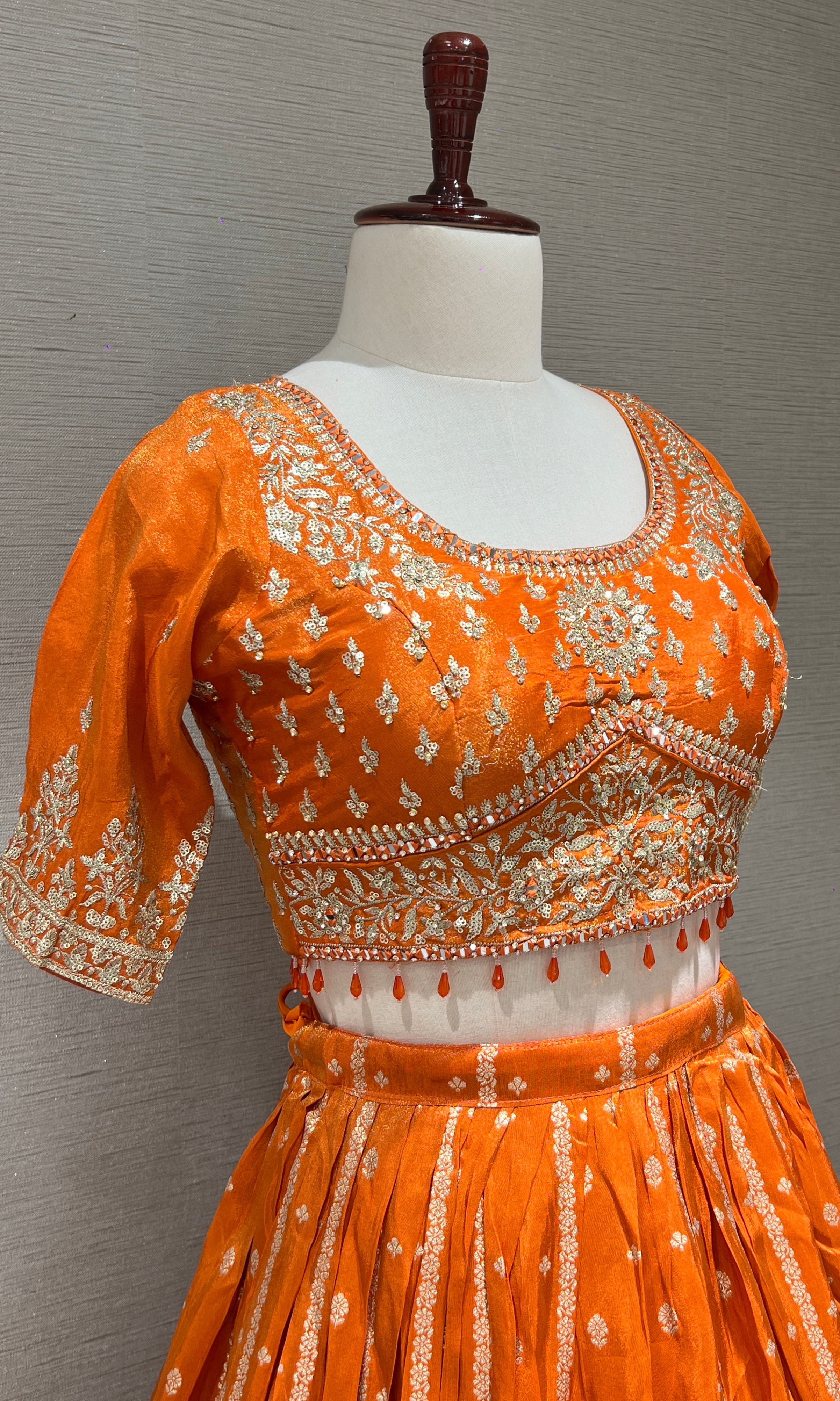 Orange Lehenga with Golden embroidery