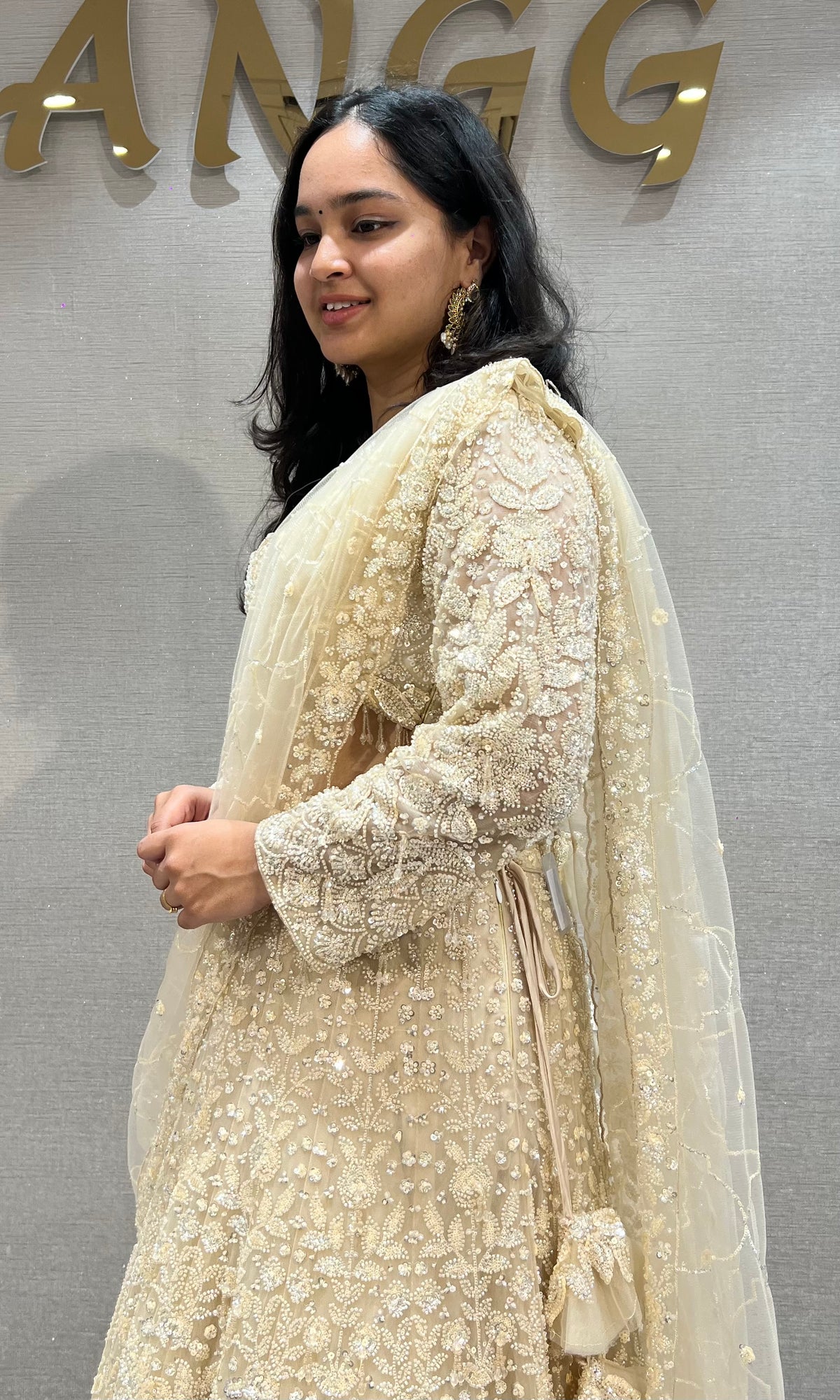 Cream soft net intricate floral Embroidery bridal lehenga