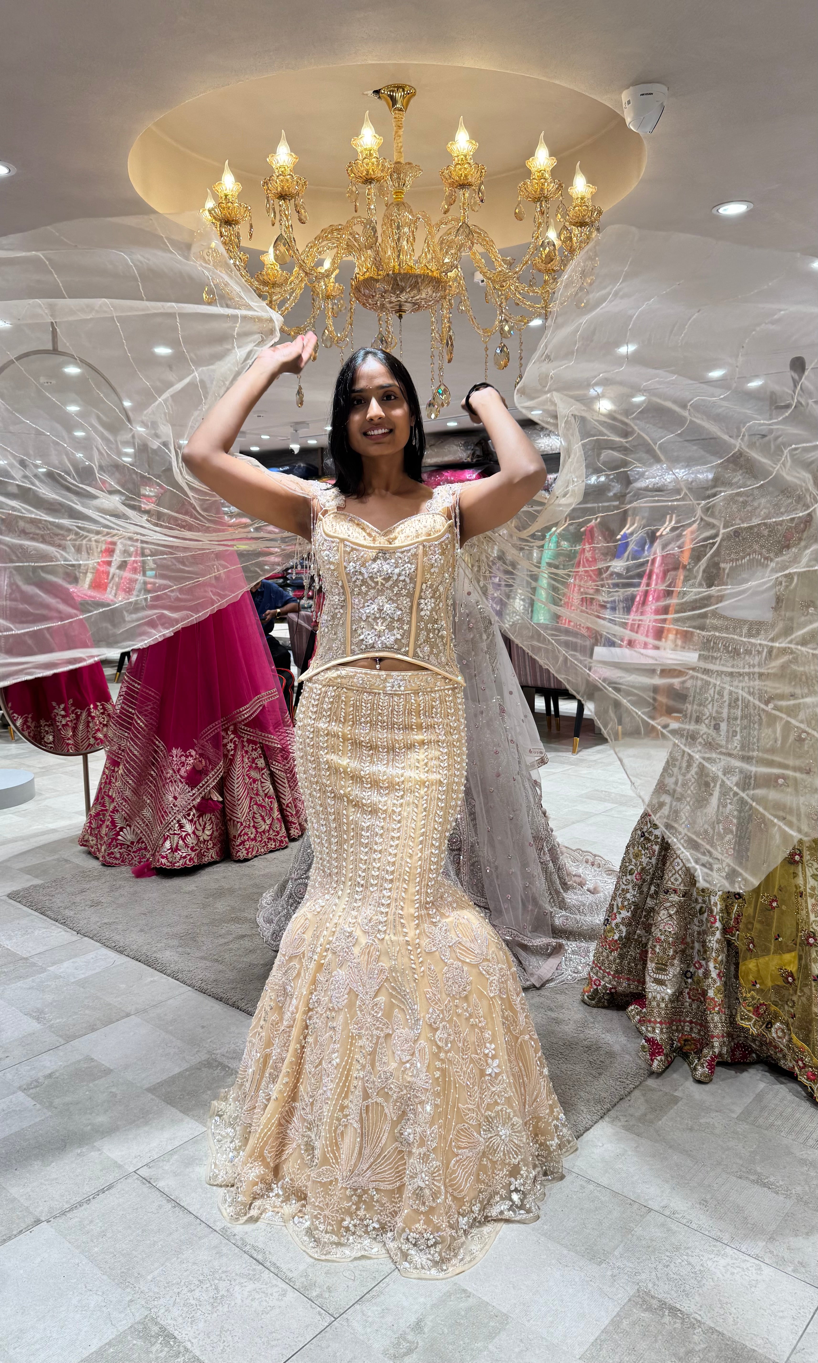 GOLD LEHENGA WITH CORSET BLOUSE & CAPE