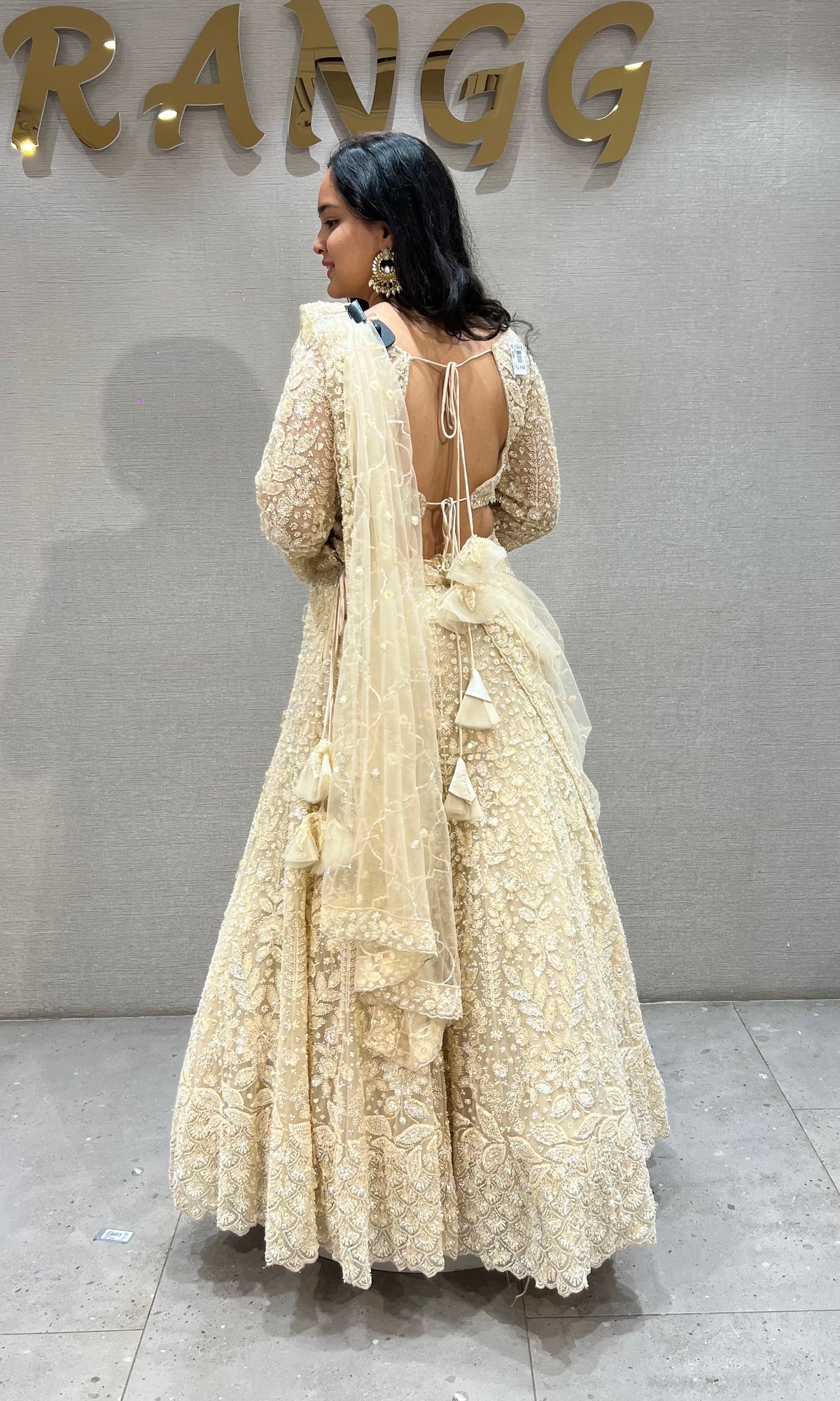 Cream soft net intricate floral Embroidery bridal lehenga