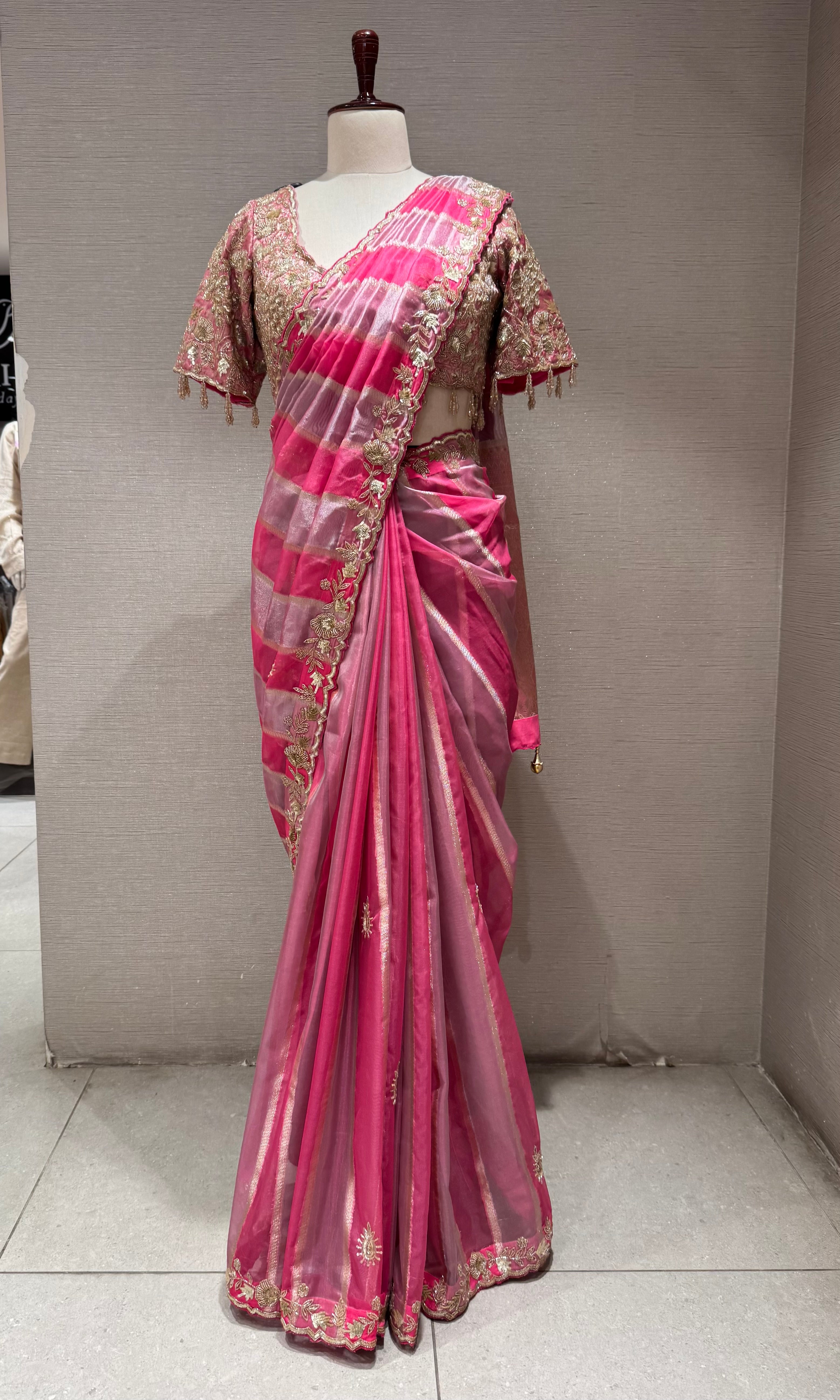 pink leheriya tissue saree with embellished blouse