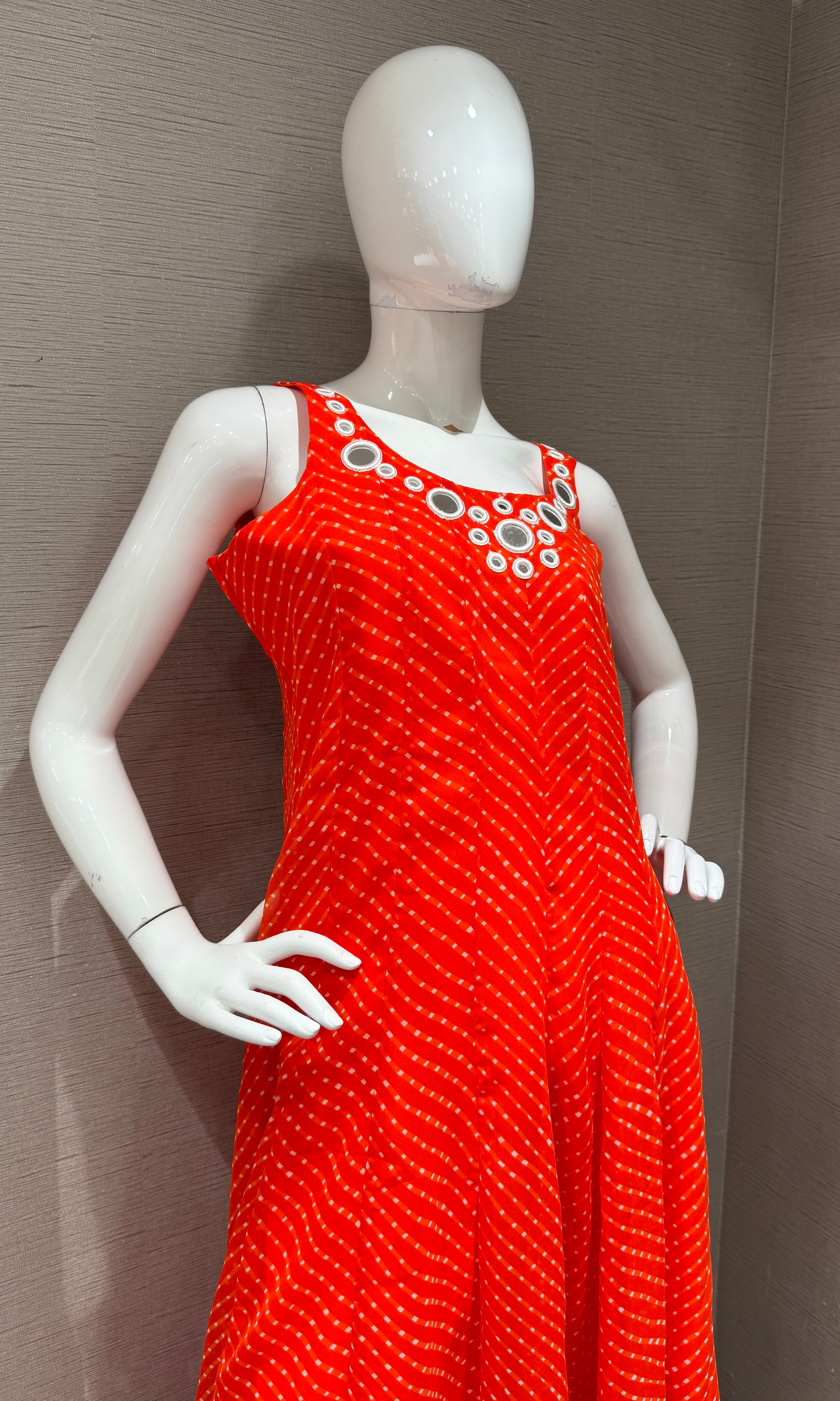Orange bandhani print and intricate mirror anarkali set