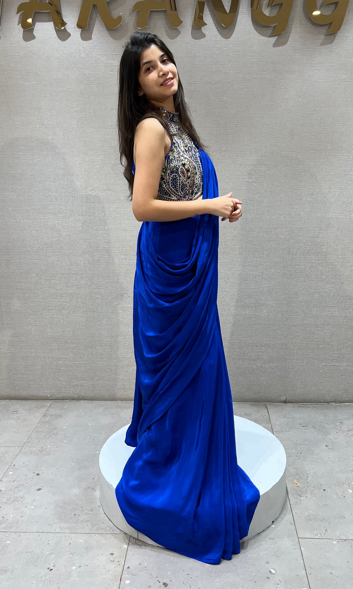 Royal blue draped saree with Crystals & Beadwork Halter blouse