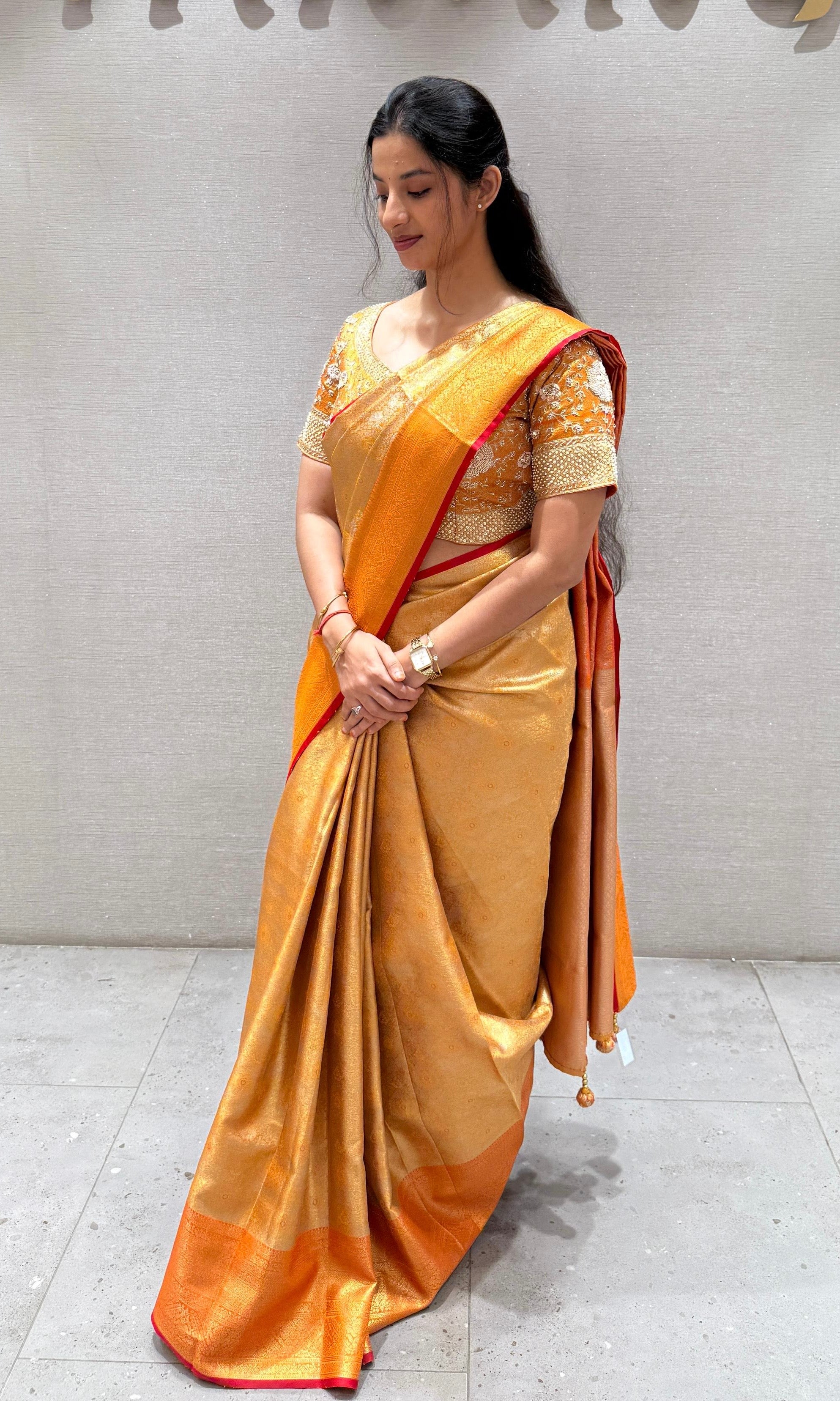 Orange pattu saree with ready blouse
