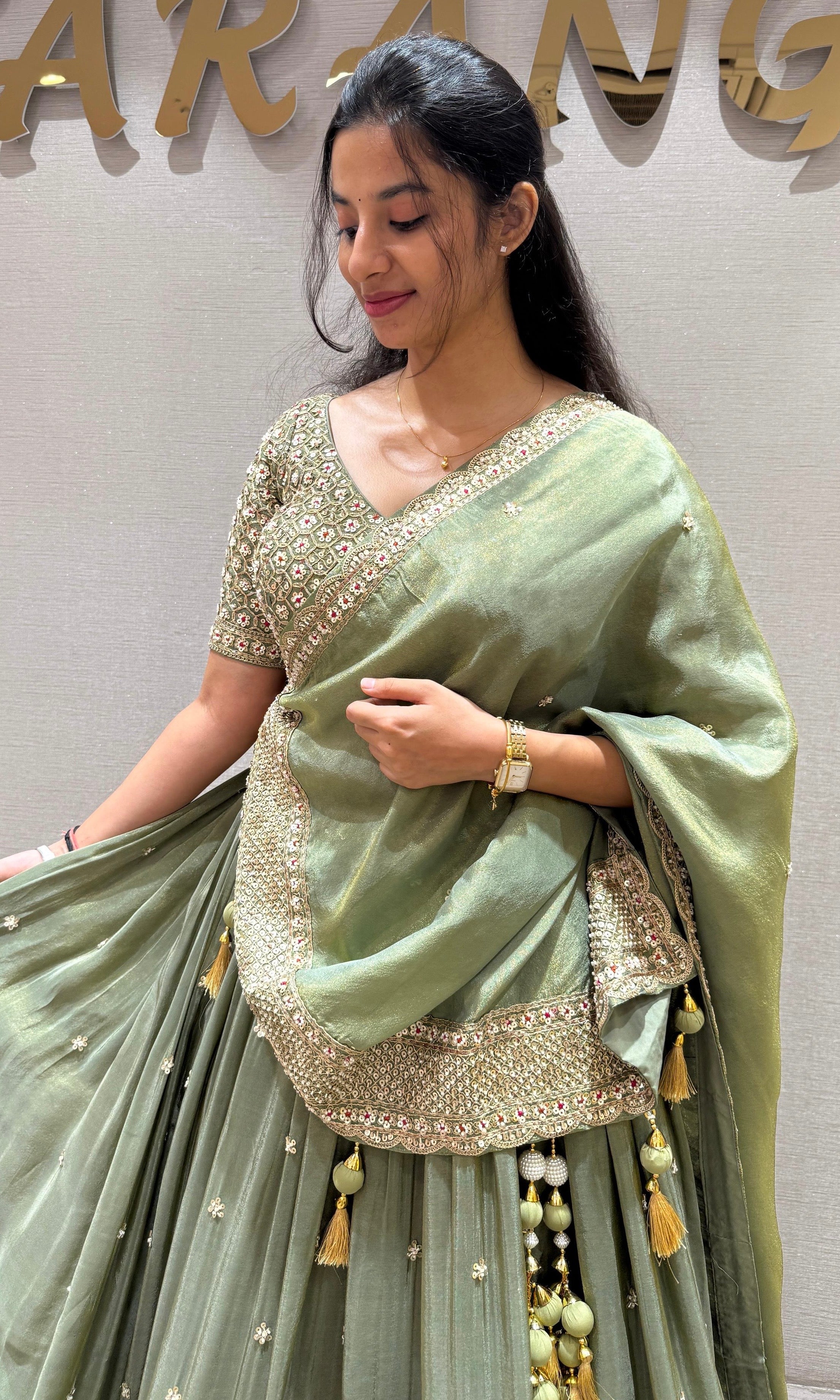 Vanika Sitara - Sage Green Lehenga with Floral & Gold Thread Work Embellishments