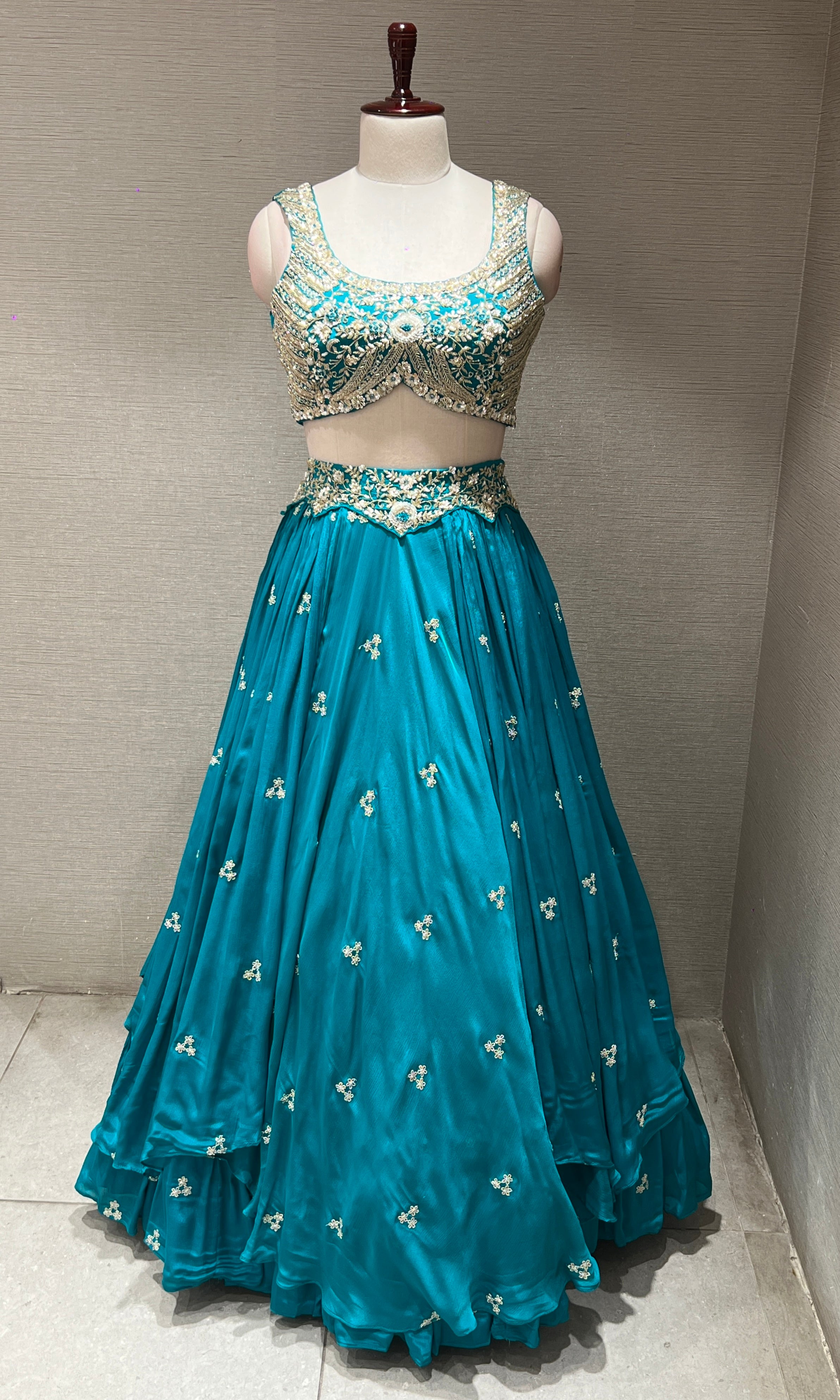 Teal blue gold zari embroidered lehenga