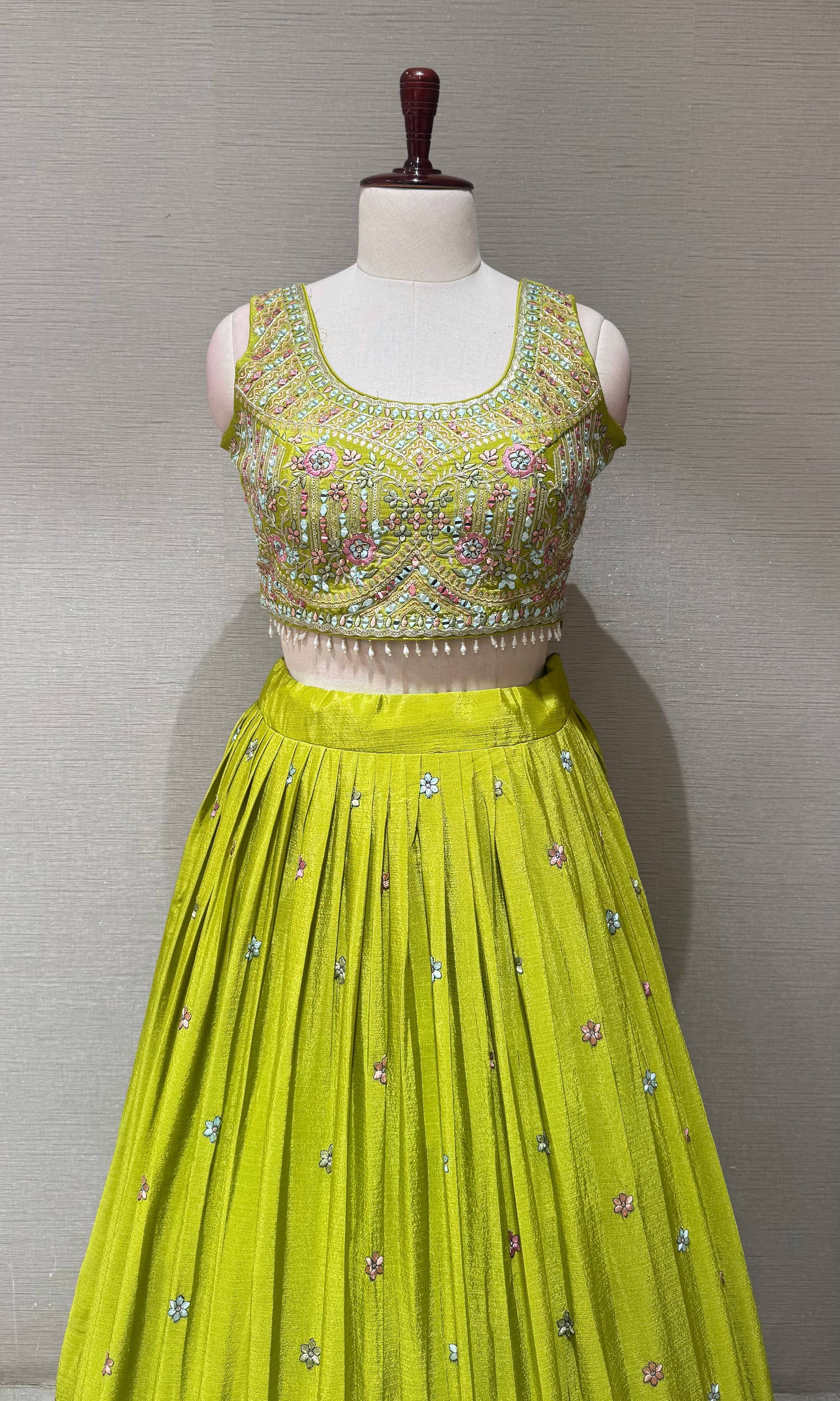Green Tissue silk lehenga set with intricate floral embroidery