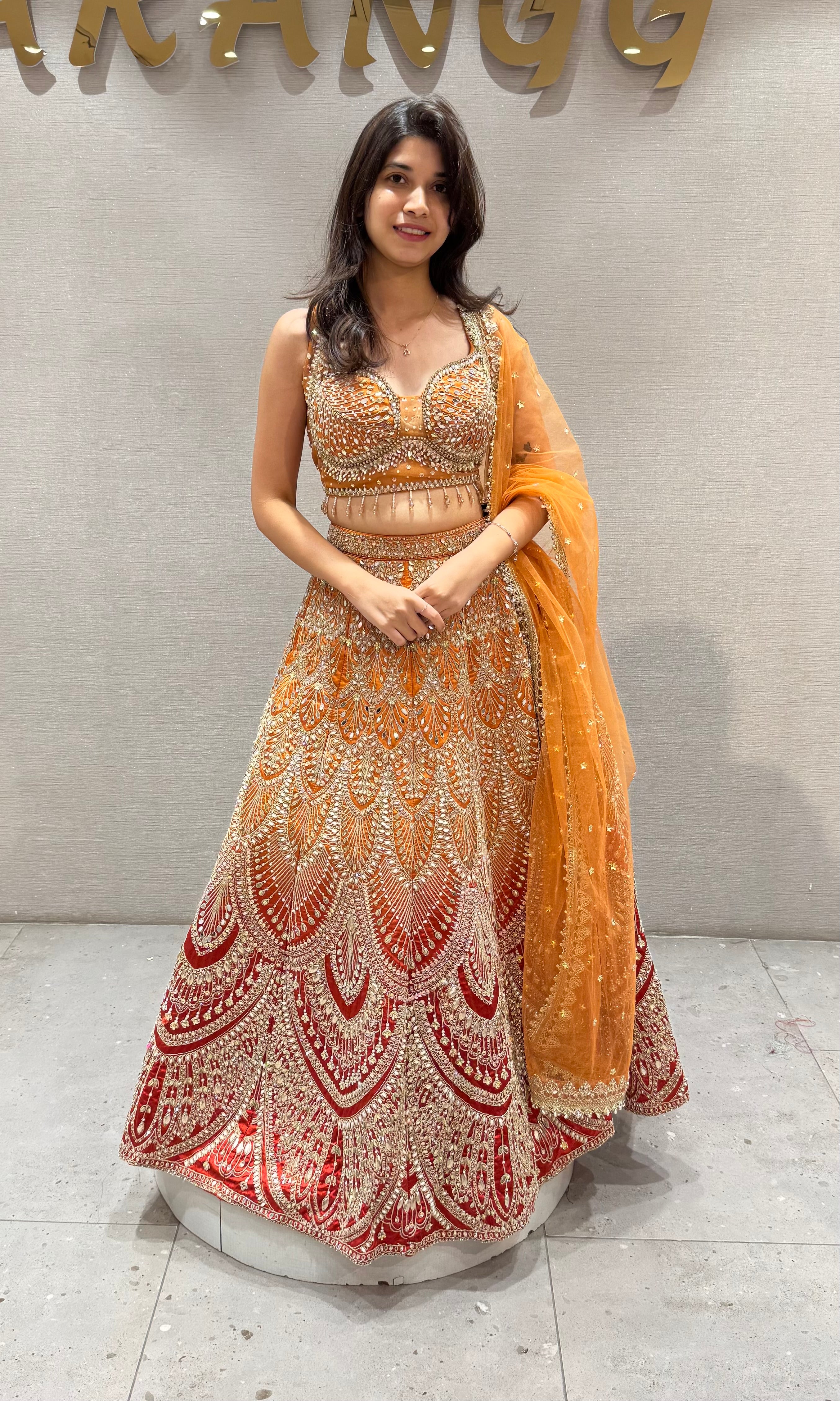 Ornate Rust and Gold Silk Lehenga Choli