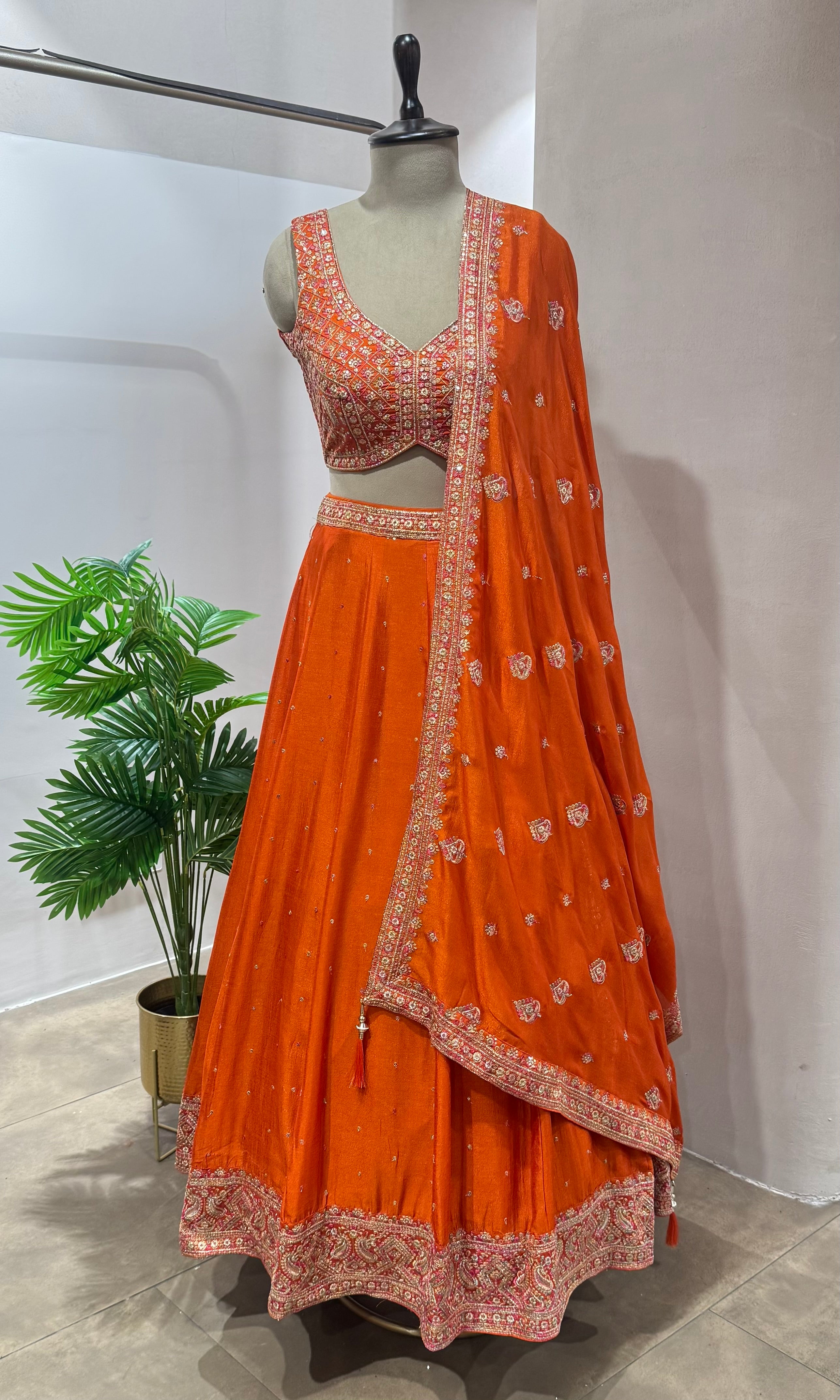 Orange embroidered Lehenga with ethnic dupatta