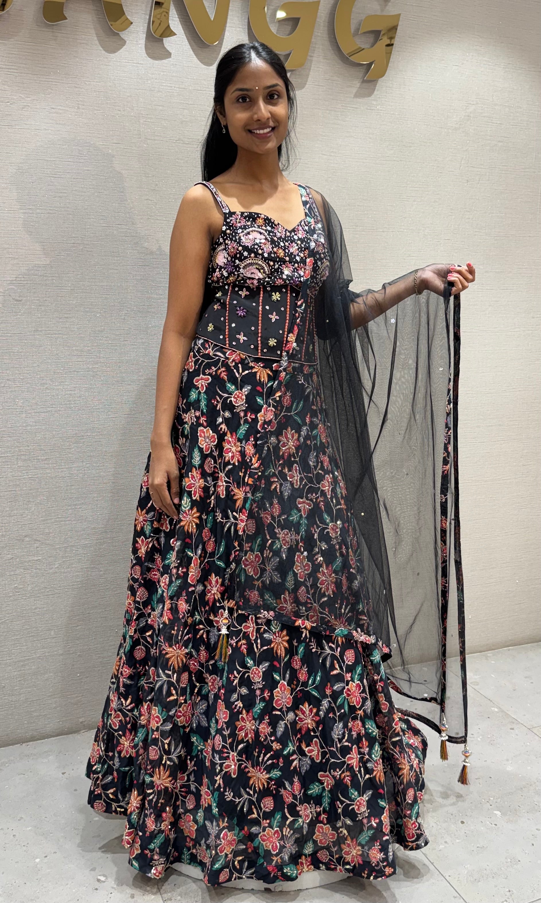 black floral printed lehenga set with corset blouse