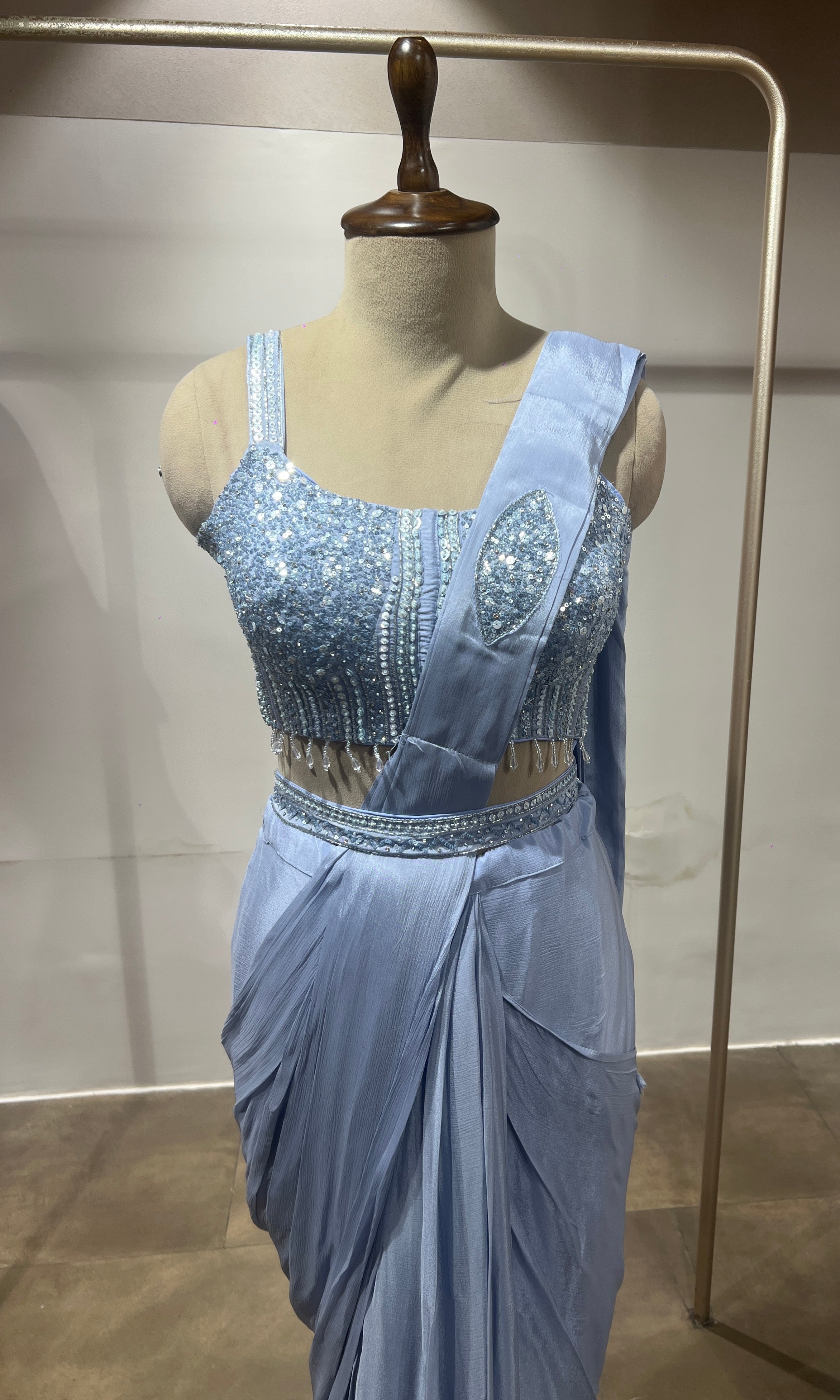 Blue satin drape saree with embellished blouse