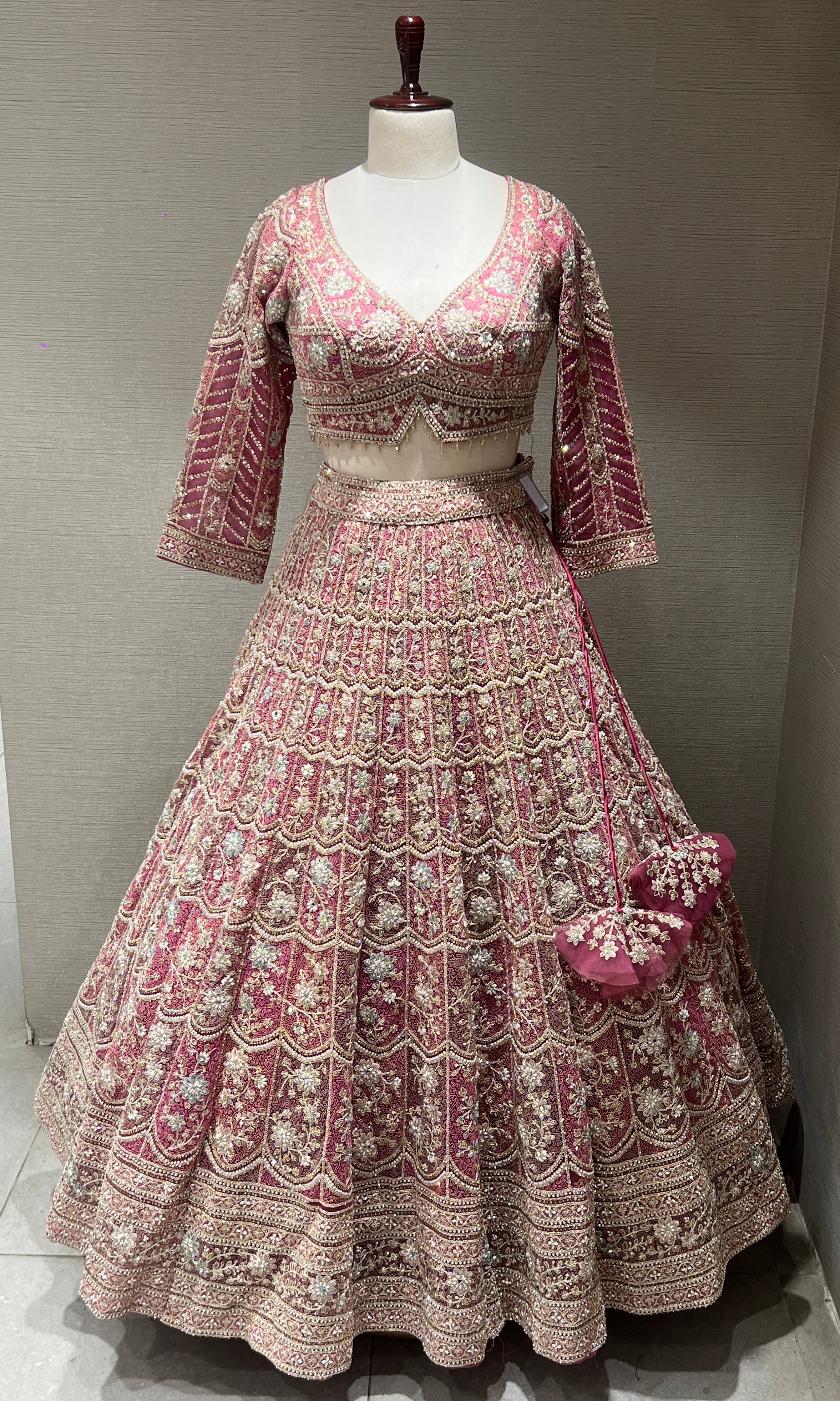 Pink lehenga with intricate embroidery and zari work